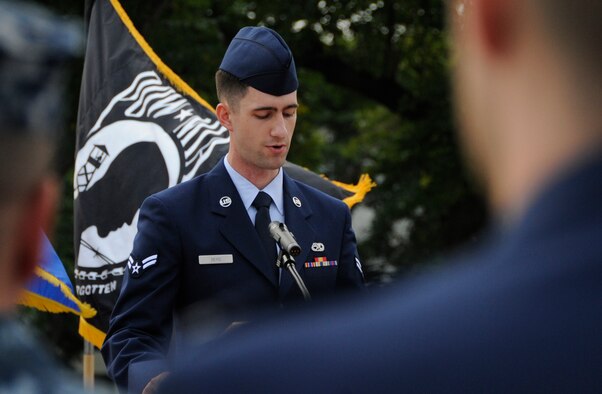 Airman 1st Class Zachary Berg, 35th Aircraft Maintenance Squadron aerospace propulsion apprentice, gave a speech about Tech. Sgt. Paul Airey during the Prisoner of War and Missing in Action remembrance ceremony at Misawa Air Base, Japan, Sept. 20, 2013. Airey became a prisoner of war July 1, 1944, after crashing in Hungary during a combat mission. (U.S. Air Force photo by Airman 1st Class Kaleb Snay)