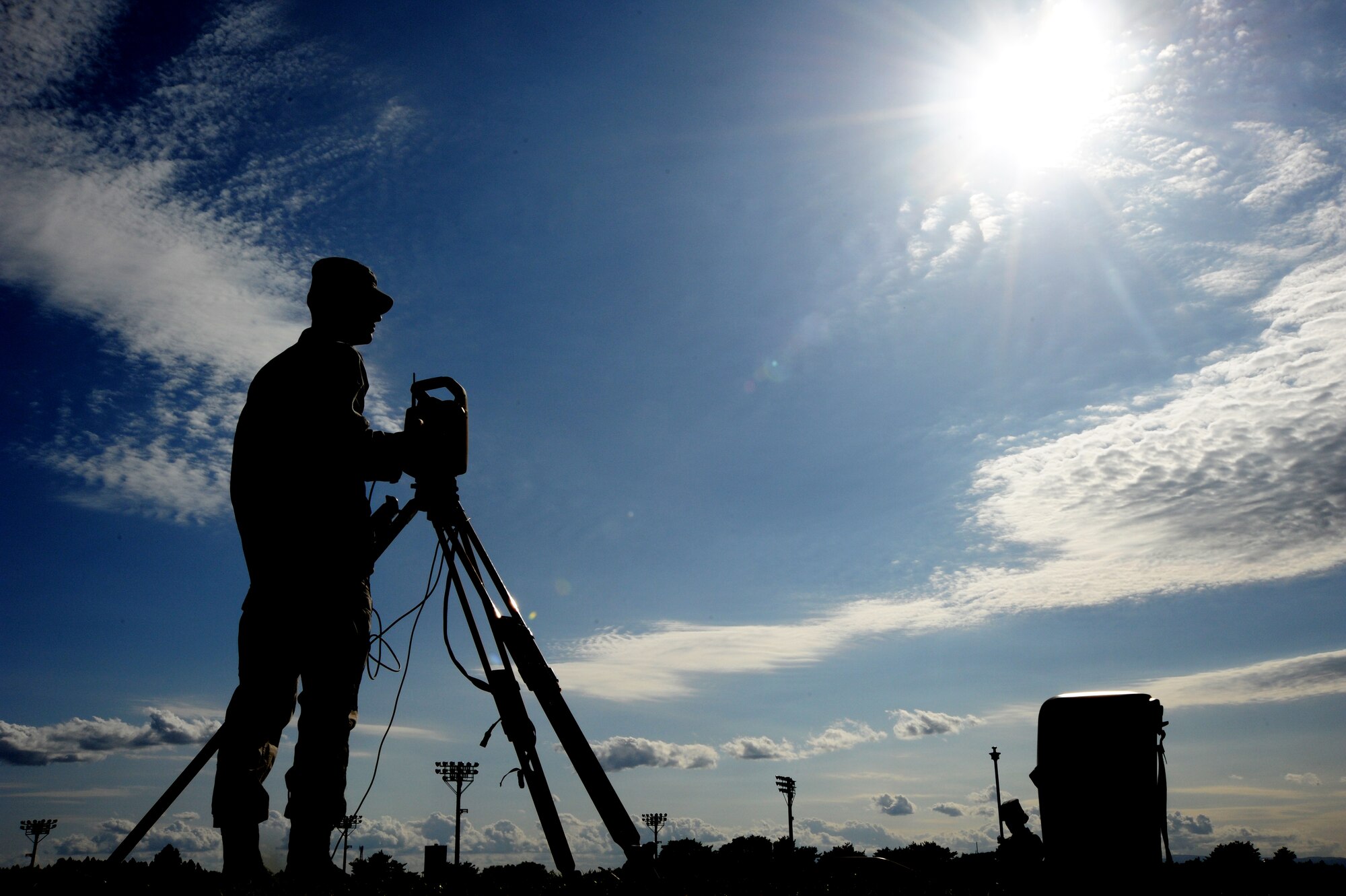 Airman Kevin O'Brien, 35th Civil Engineer Squadron, uses a geodimeter at Misawa Air Base, Japan, Sept. 18, 2013. Engineers at Misawa use these GPS devices to help U.S. Air Force F-16 Fighting Falcons identify and move location points on airfields. (U.S. Air Force photo by Senior Airman Derek VanHorn)