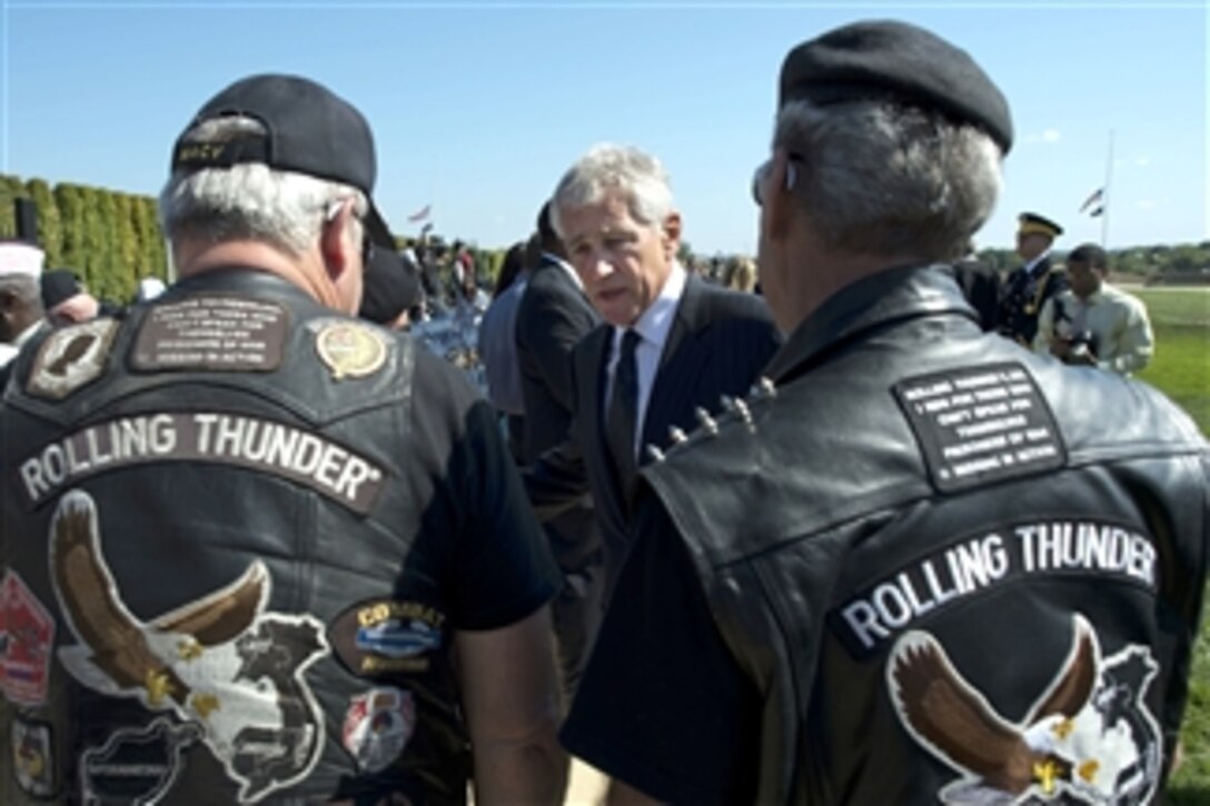 Secretary of Defense Chuck Hagel greets members of "Rolling Thunder" after the Department of Defense National POW/MIA Recognition Day ceremony at the Pentagon in Arlington, Va., on Sept. 20, 2013.  The ceremony pays tribute to those service members who have not returned from the battlefield and those who are held captive as prisoners of war.  