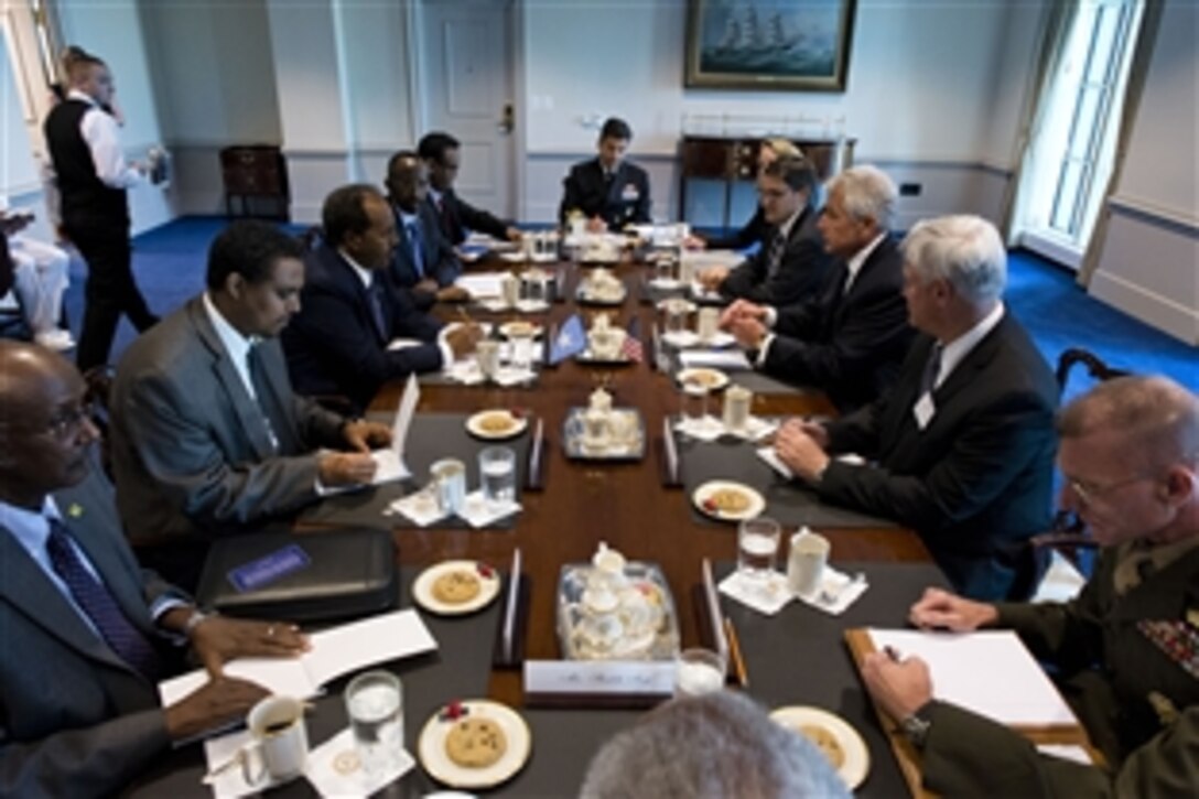U.S. Defense Secretary Chuck Hagel meets with Somalian President Hassan Sheikh Mahamud at the Pentagon, Sept. 20, 2013. The two leaders met to discuss issues of mutual importance.  
