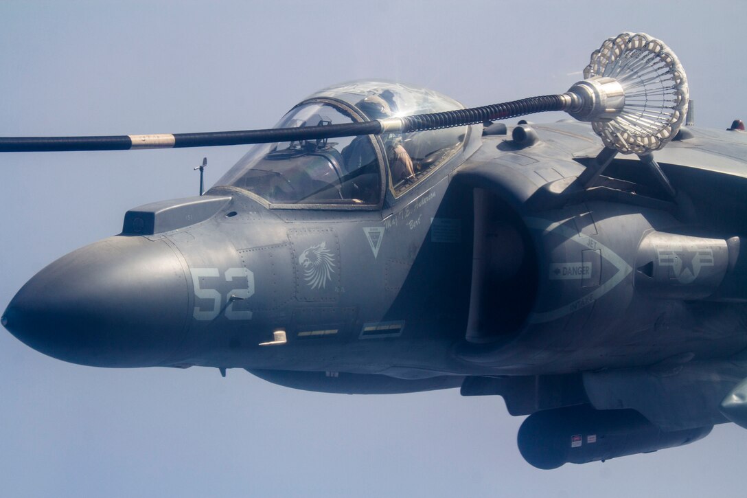A U.S Marine Corps AV-8B Harrier assigned to Marine Medium Tiltrotor Squadron (VMM) 266 (Reinforced), 26th Marine Expeditionary Unit (MEU), conducts an aerial refueling with a KC-130 assigned to Command Element, 26h MEU, at 18,000 feet in Djibouti, Africa, Sept. 19, 2013. The 26th MEU is a Marine Air-Ground Task Force forward-deployed to the U.S. 5th and 6th Fleet areas of responsibility aboard the Kearsarge Amphibious Ready Group serving as a sea-based, expeditionary crisis response force capable of conducting amphibious operations across the full range of military operations. (U.S. Marine Corps photo by Cpl. Kyle N. Runnels/Released)