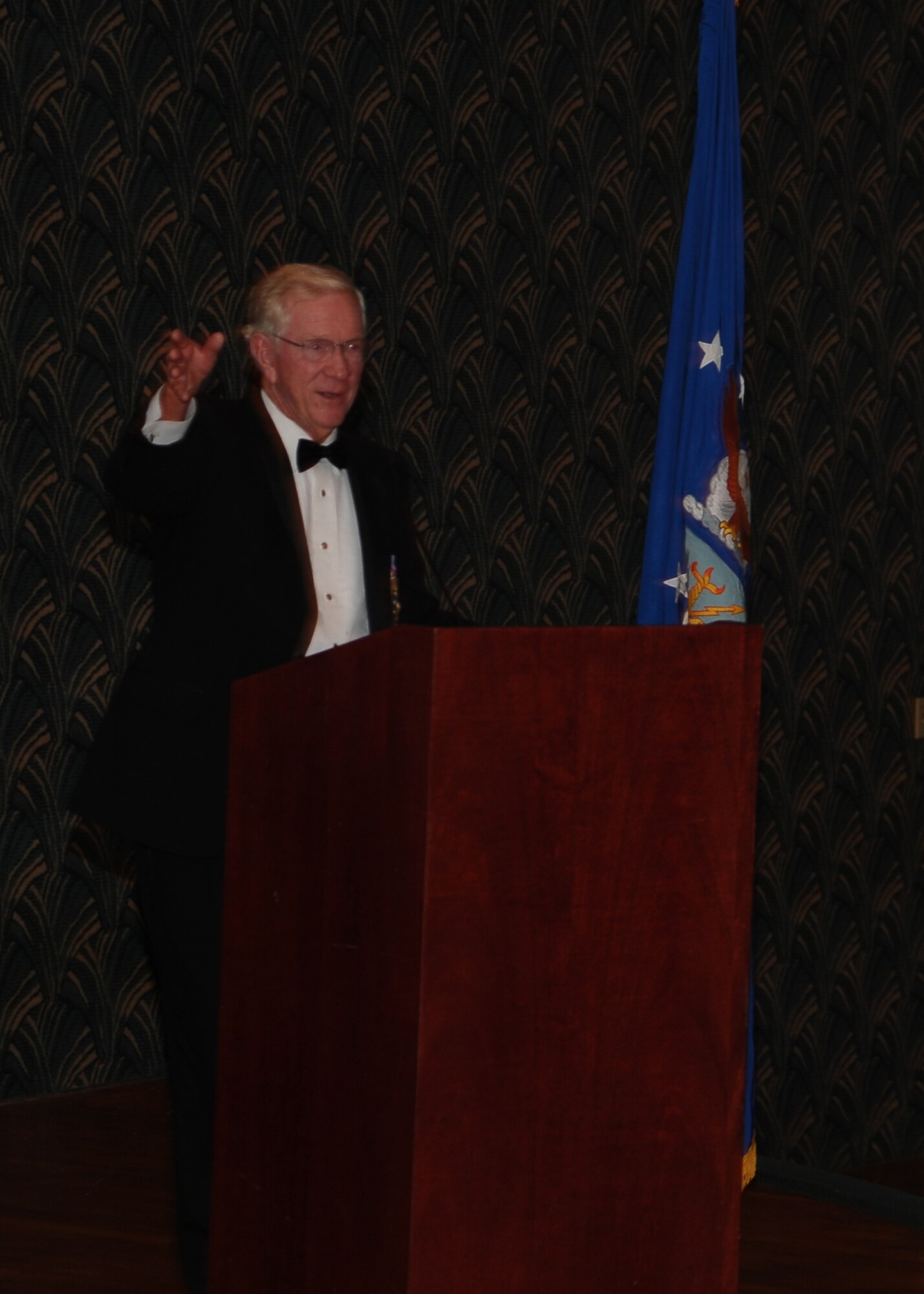 Retired Lt. Col. Richard "Gene" Smith gives a speech at the 2013 Air Force Birthday Ball Sept. 20 at the Trotter Convention Center in Downtown Columbus. Smith, who talked about what made a hero and about serving your country (no matter what), was repatriated March 14, 1973 after he was a prisoner of war for five and a half years after being shot down over Hanoi, Vietnam. (U.S. Air Force Photo/Airman 1st Class Stephanie Englar)