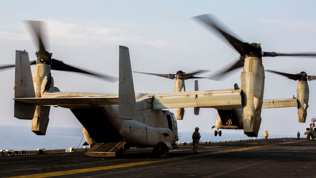 An MV-22B Osprey assigned to Marine Medium Tiltrotor Squadron (VMM) 266 (Reinforced), 26th Marine Expeditionary Unit (MEU), on the flight deck of the USS Kearsarge (LHD 3), Sept. 22, 2013. The 26th MEU is a Marine Air-Ground Task Force forward-deployed to the U.S. 5th and 6th Fleet areas of responsibility aboard the Kearsarge Amphibious Ready Group serving as a sea-based, expeditionary crisis response force capable of conducting amphibious operations across the full range of military operations. (U.S. Marine Corps photo by Sgt. Christopher Q. Stone, 26th MEU Combat Camera/Released)