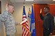 Chaplain First Lieutenant Emmanuel Enoh takes the oath as spoken by Lt. Col. Roger S. Stoekmann Sept. 20, at Scott Air Force Base.  (U.S. Air Force photo by Major Stan Paregien) 