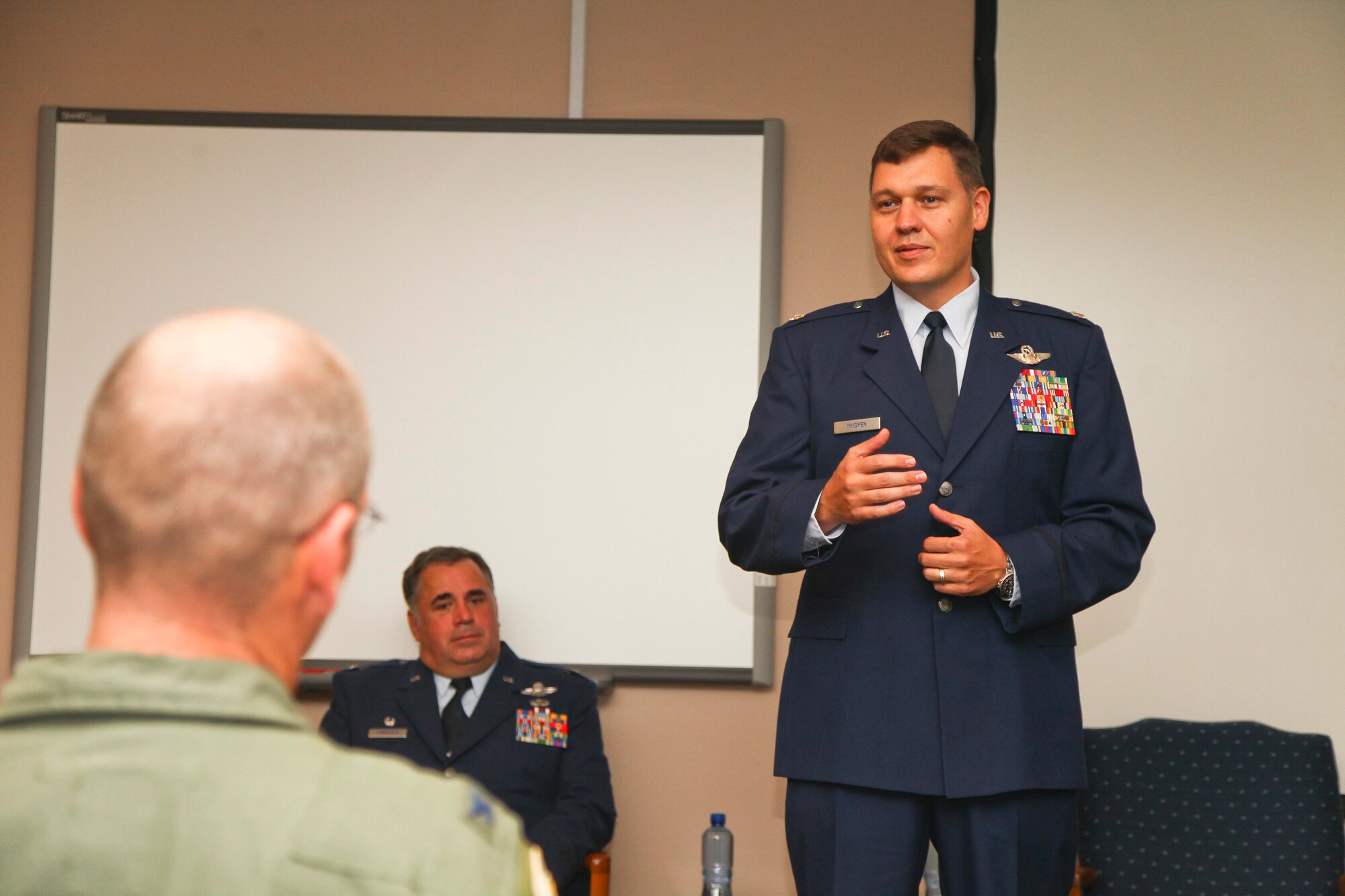 Lt. Col. Don L. Thigpen II address his squadron members for the first time as 315th Airlift Control Flight squadron commander during a change of command ceremony today in the Yonkie Auditorium here at Joint Base Charleston, S.C. Thigpen is succeeding previous commander Lt. Col. Zebedee O. T. Lau as the unit’s commander. (U.S. Air Force photo by Staff Sgt. Rashard Coaxum/released)
