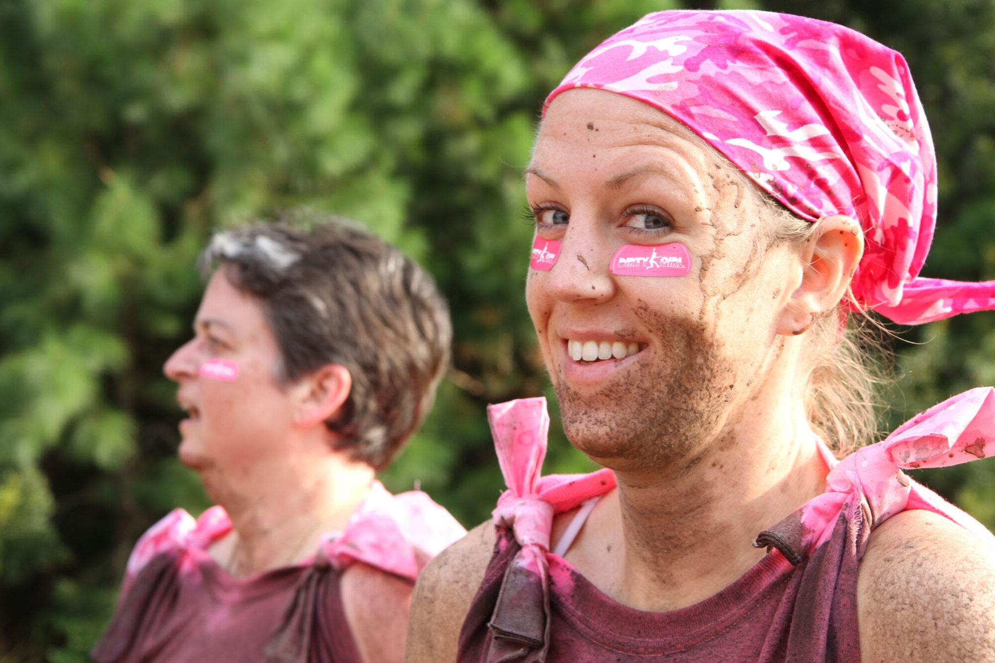 Tech. Sgt. Kristin Dierkhising, United States Air Force Reserve recruiter with the 315th Airlift Wing, shows off her muddy face during the Dirty Girl Mud Run Saturday Sept. 14, 2013, held at Legare Farms on Johns Island, S.C. The women’s-only 5K run helps raise money for breast and ovarian cancer research while also increasing awareness of the warning signs and symptoms of these diseases.