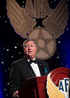 Former Secretary of the Air Force Michael Donley gives comments after accepting the W. Stuart Symington Award during the United States Air Force Anniversary Dinner Sept. 18, 2013, at the National Harbor, Washington, D.C. The dinner celebrated the 66th Anniversary of the Air Force during the Air Force Association's 2013 Air & Space Conference and Technology Exposition. AFA sponsors the annual conference to promote professional development in support of the total Air Force. Named after the first Secretary of the Air Force the W. Stuart Symington award is presented for the most significant contribution by a civilian in the field of national defense. (U.S. Air Force photo/Jim Varhegyi)