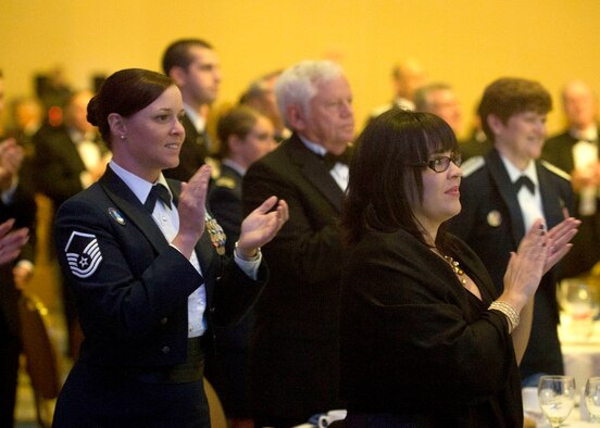 Attendees sing the Air Force song as the Air Force Association culminated the 2013 Air & Space Conference and Technology Exposition by hosting the United States Air Force Anniversary Dinner on Sept. 18, 2013, at the National Harbor, Washington, D.C. The dinner celebrated the 66th Anniversary of the Air Force. The AFA sponsors the annual  conference to promote professional development in support of the total Air Force. (U.S. Air Force photo/Jim Varhegyi)(released)