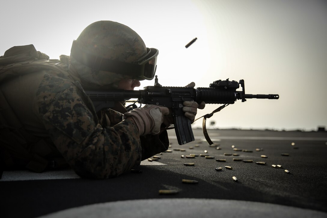 A Marine with Africa Partnership Station 13 fires his weapon during a battle sight zero range September 8, 2013.  Today, APS represents a wide spectrum of engagements throughout Africa, , to include conducting a BZO range, to ensure the host nations get the most out of the training. 