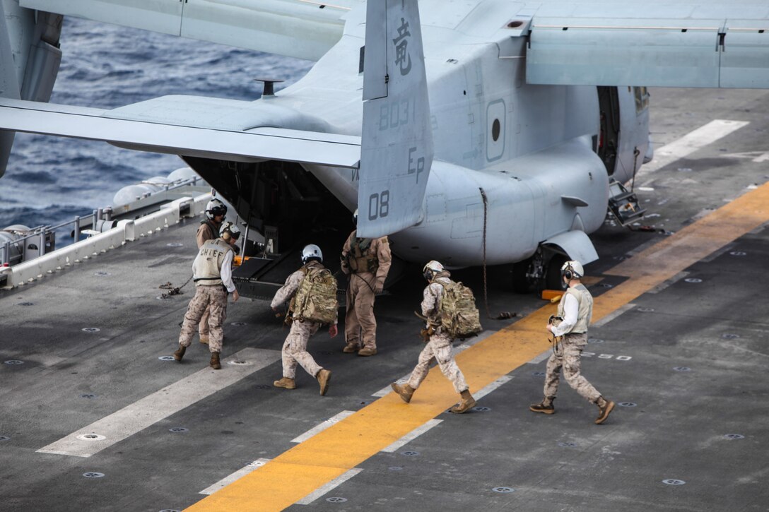 Marines with the Military Information Support Operations team carry two Long Range Acoustic Device 100x onto an MV-22 Osprey with Marine Medium Tiltrotor Squadron 265 (Reinforced), 31st MEU, here, July 8. The team tested the device to ensure it could be operated effectively over the noise of the Osprey. Two LRAD devices were tethered together in order to boost the volume and compensate for the surrounding aircraft noise. The LRAD met expectations by providing a crisp, clear message over the sound of the aircraft’s rotors from more than 500 meters away. The 31st MEU is currently conducting their regularly scheduled Fall Patrol. The 31st MEU is the Marine Corps’ force in readiness for the Asia-Pacific region and is the only continuously forward-deployed MEU. 