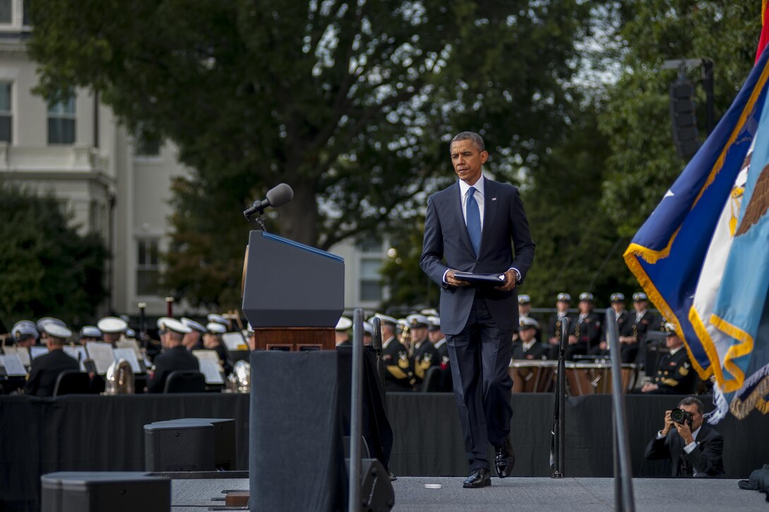 President Barack Obama delivered remarks during the Navy Yard Memorial Ceremony to remember and honor the victims of last week's shooting and their families at Marine Barracks Washington, D.C., Sept. 22. Chief of Naval Operations Adm. Jonathan W. Greenert, Mayor Vincent Gray (DC), Secretary of the Navy Ray Mabus and Secretary of Defense Chuck Hagel also delivered remarks during the ceremony. Barracks Marines hosted the ceremony alongside their Navy counterparts.