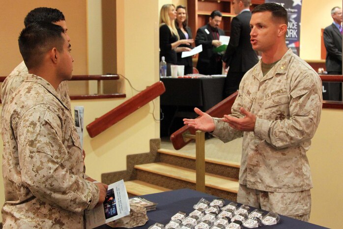 Maj. David L. Baril speaks to Marines about the Marine for Life program during the Hiring Our Heroes job fair held at the Pacific Views Event Center here Sept. 19. Marine for Life is a Marine Corps organization that provides nationwide assistance to Marines returning to civilian life. Baril is the Marine Corps Installations West liaison for Marine for Life.
