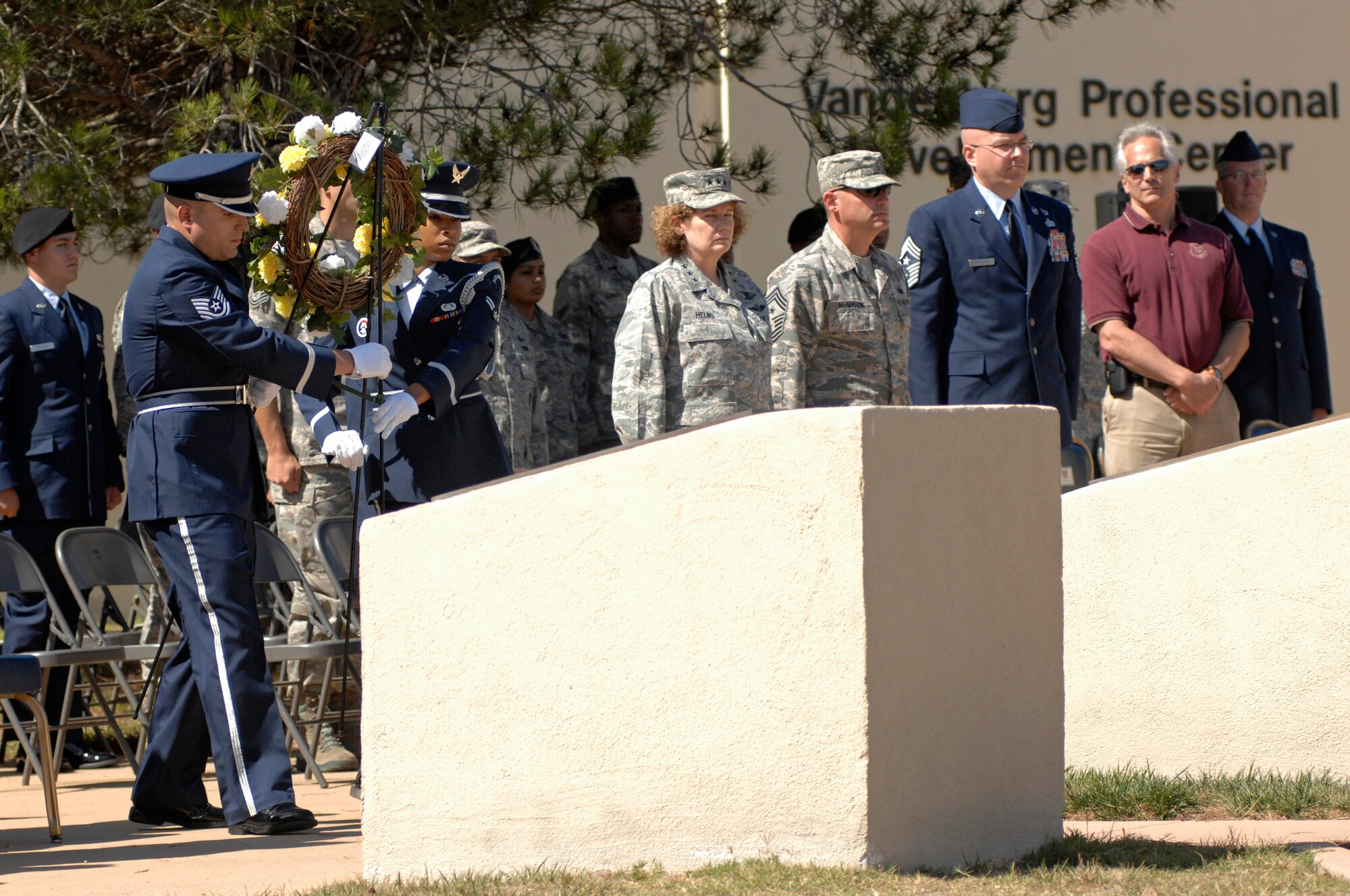 VANDENBERG AIR FORCE BASE, Calif. -- Vandenberg Airmen place a ceremonial wreath honoring U.S. military members imprisoned while serving in conflicts and those who remain missing during a POW/MIA remembrance ceremony here Friday, Sept. 20. The ceremony marked the 34th United States' National POW and MIA Recognition Day observed across the nation on the third Friday of September each year and was preceded by a 24-hour name reading vigil. (U.S. Air Force photo/Michael Peterson)
