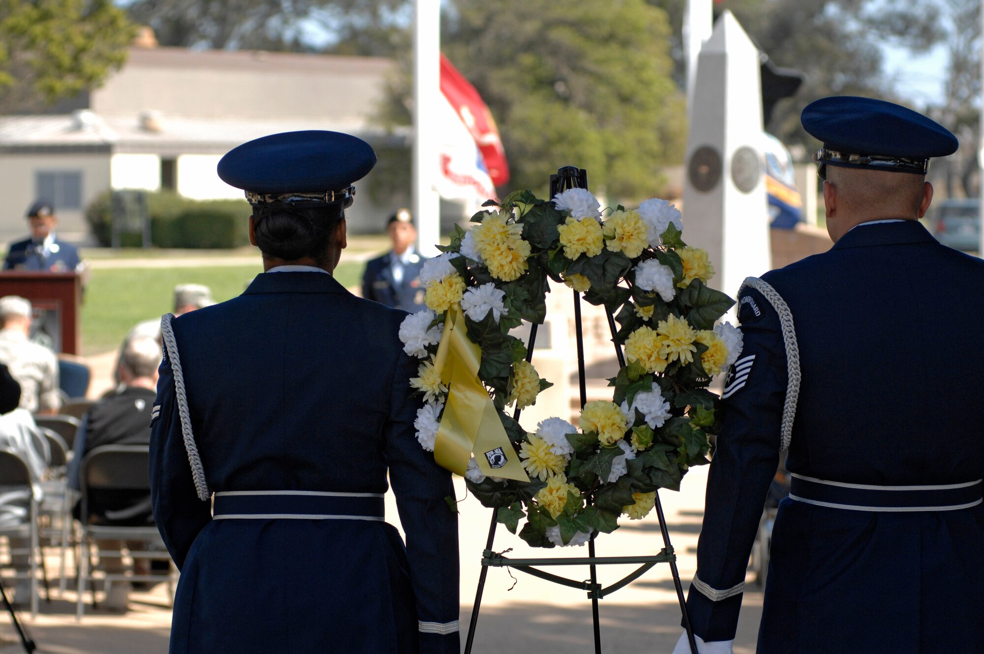 VANDENBERG AIR FORCE BASE, Calif. -- Vandenberg Airmen prepare to place a ceremonial wreath honoring U.S. military members imprisoned while serving in conflicts and those who remain missing during a POW/MIA remembrance ceremony here Friday, Sept. 20. The ceremony marked the 34th United States' National POW and MIA Recognition Day observed across the nation on the third Friday of September each year and was preceded by a 24-hour name reading vigil. (U.S. Air Force photo/Michael Peterson)