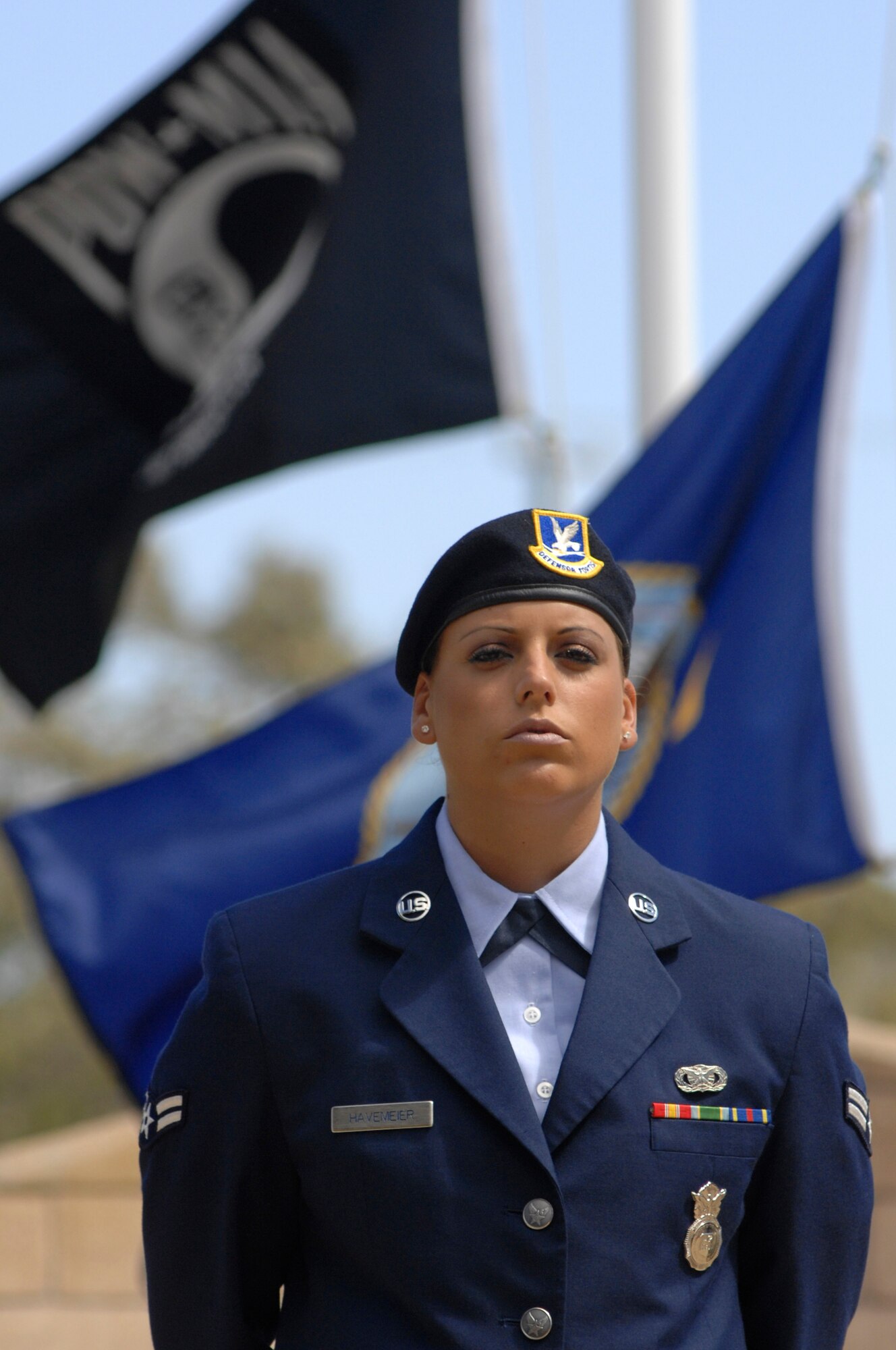 VANDENBERG AIR FORCE BASE, Calif. -- Airman 1st Class Amanda Havemeier, 30th Security Forces Squadron member, stands guard at the POW/MIA Memorial during a 24-hour name reading vigil here Friday, Sept. 20. The vigil culminated in a special ceremony marking the 34th United States' National POW and MIA Recognition Day observed across the nation on the third Friday of September each year. (U.S. Air Force Photo/Michael Peterson)