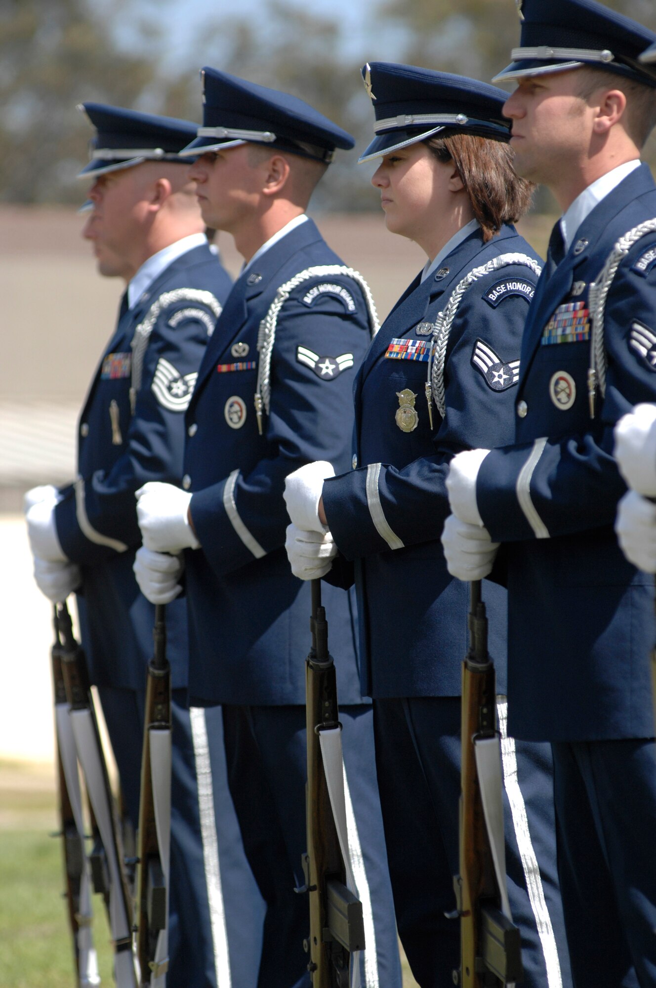 VANDENBERG AIR FORCE BASE, Calif. -- Vandenberg Honor Guard members stand ready to perform military honors during a POW/MIA remembrance ceremony here Friday, Sept. 20. The ceremony marked the 34th United States' National POW and MIA Recognition Day observed across the nation on the third Friday of September each year and was preceded by a 24-hour name-reading vigil. (U.S. Air Force photo/Michael Peterson)