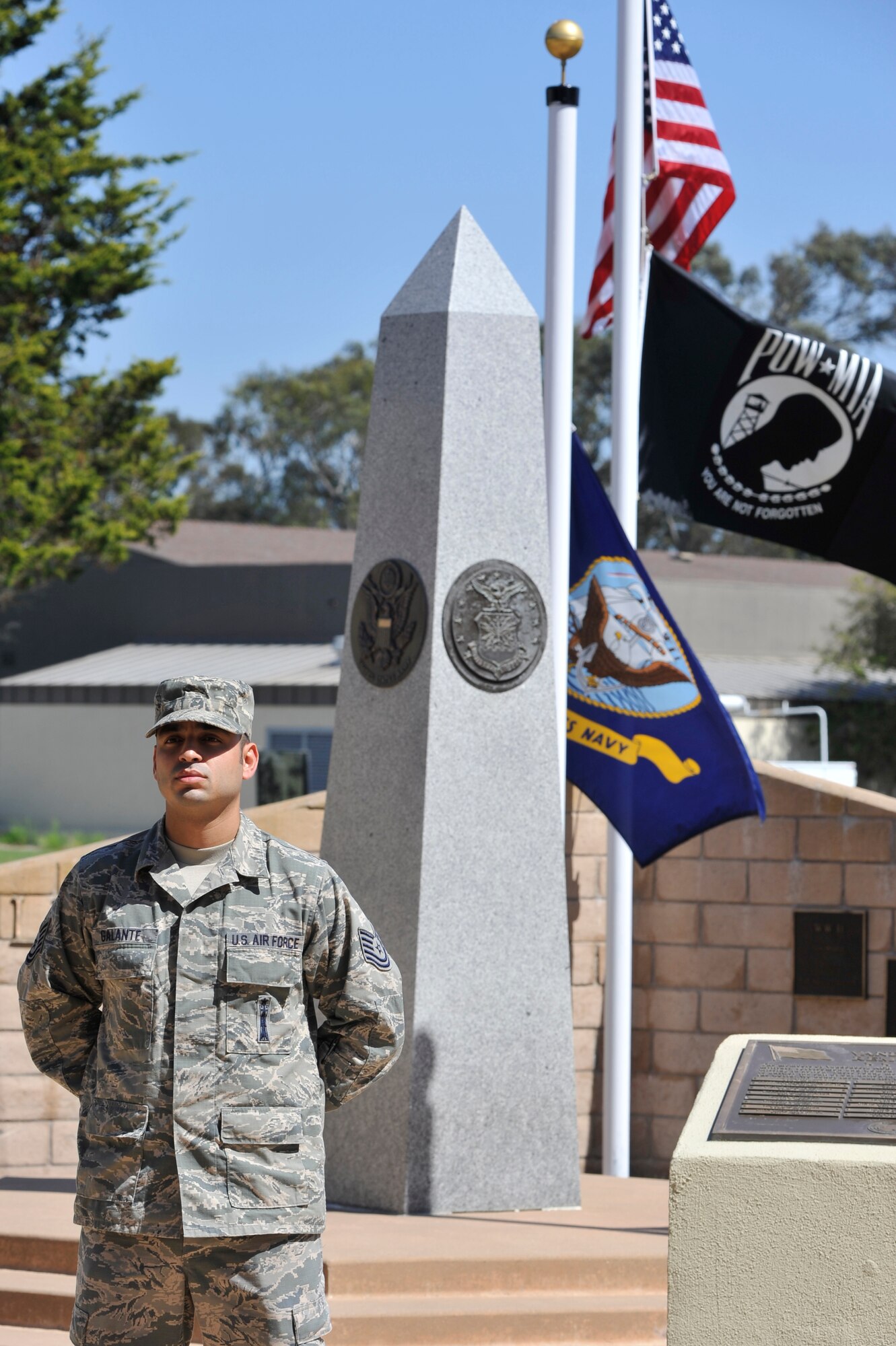VANDENBERG AIR FORCE BASE, Calif. -- Tech. Sgt. Michael Galante, 1st Air and Space Test Squadron spacelift maintenance technician, stands guard at the POW/MIA Memorial during a 24-hour name reading vigil here Thursday, Sept. 19. The vigil culminated in a ceremony on Friday, Sept. 20, marking the 34th United States' National POW and MIA Recognition Day observed across the nation on the third Friday of September each year. (U.S. Air Force photo/Michael Peterson)