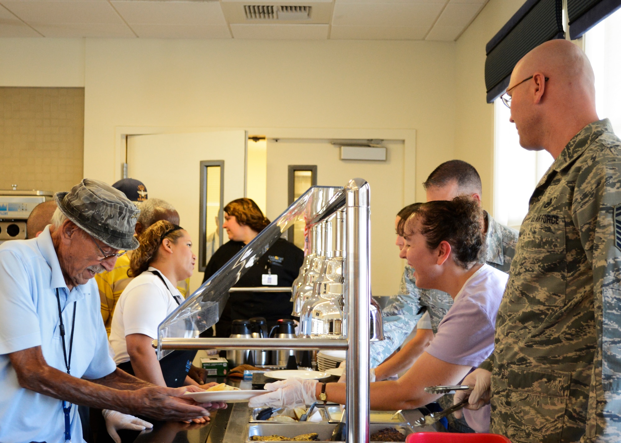 Members of the Air Force Sergeants Association served a barbeque lunch at the Lancaster Veterans Home of California Sept. 18, in honor of the 66th Air Force birthday. (U.S. Air Force photo by Rebecca Amber)

