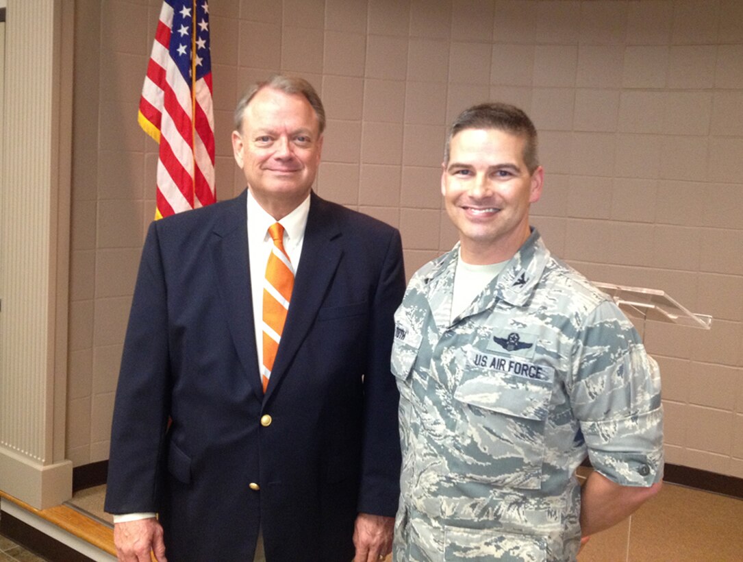 Walt Wood (left) shares a quiet moment with AEDC Commander, Col. Raymond Toth, during a special reception held in Wood’s honor.  Wood has supported AEDC for many years and says he will continue to do so in retirement. He’s worked with the Arnold Community Council since its beginning in 2000.