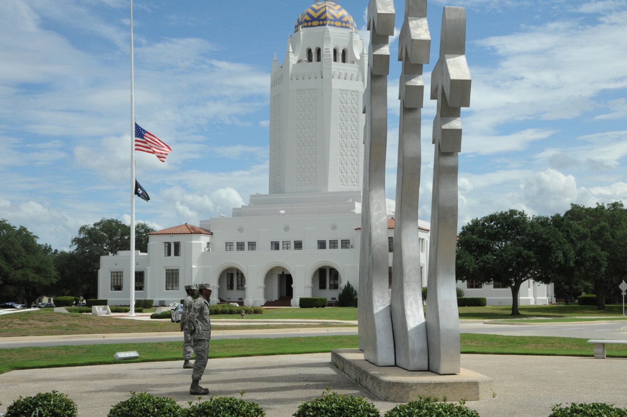 Tech. Sgt. Gilchrist and Staff Sgt. Gunter stand watch over the Missing Man Monument at JBSA-Randolph during the POW/MIA ceremony Sept. 18. (U.S. Air Force photo by Don Lindsey)