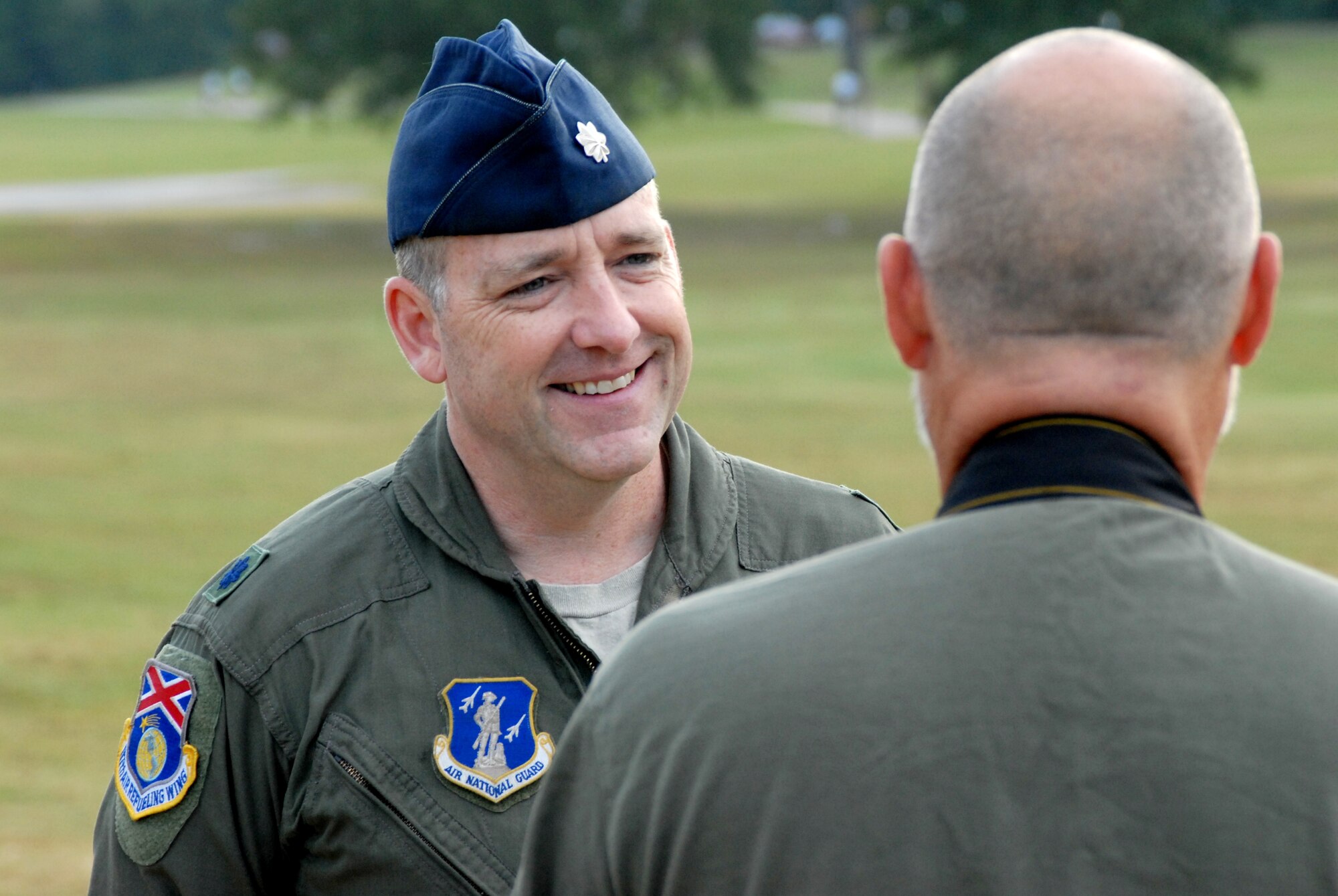 HOOVER, Ala. -- Lt. Col. Michael Phillips speaks to Joe Songer, a reporter from the Birmingham News, during an interview at the POW/MIA walk here on Friday. Phillips' father was an F-4 weapon systems operator in the Air Force and was shot down during the Vietnam War. His father was never found and was declared missing in action. (U.S. Air National Guard photo by Maj. Pam Carroll/Released)