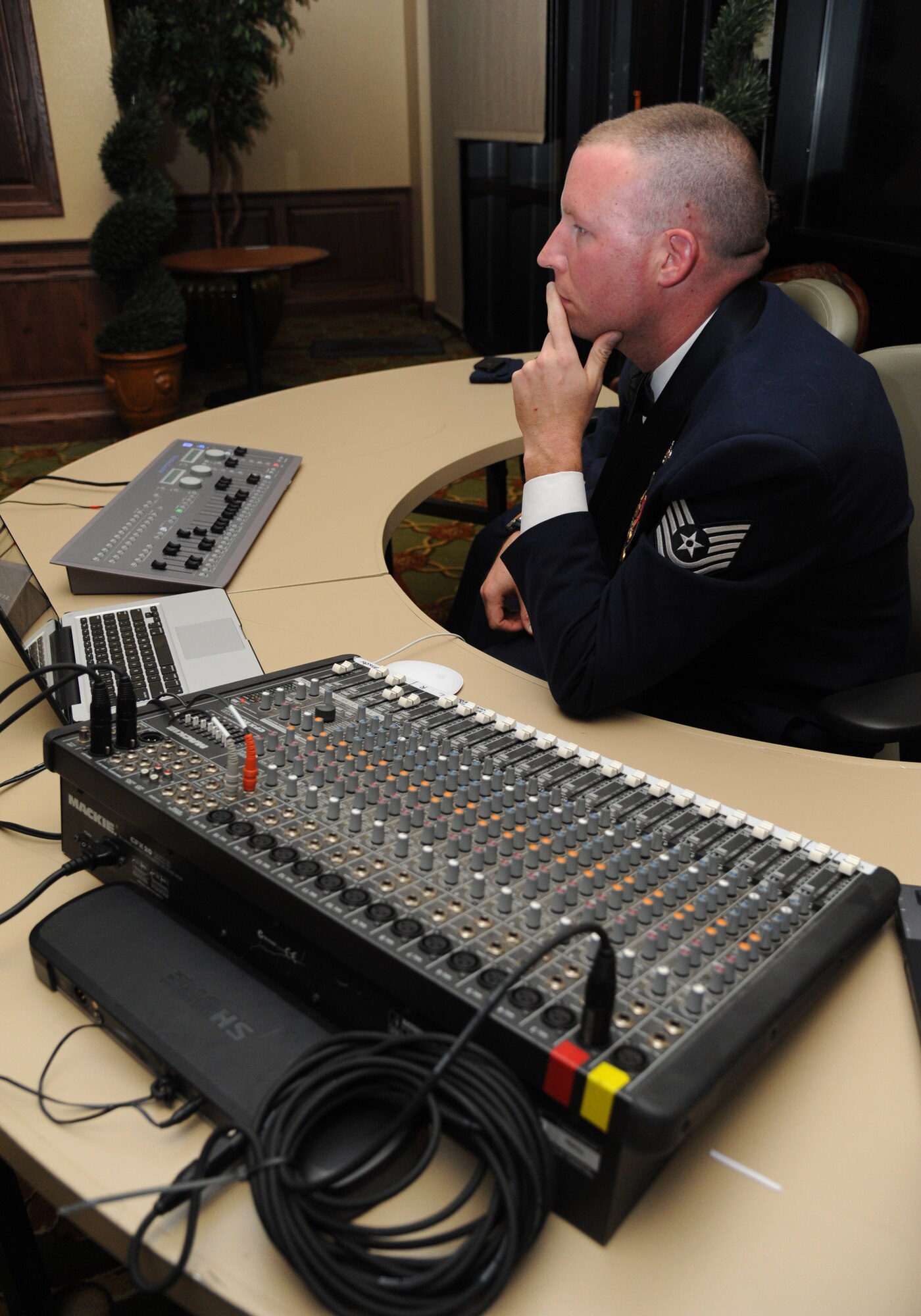 Tech. Sgt. Brian Margavich, 333rd Training Squadron, provides technical support during the Air Force’s 66th Birthday Ball on Sept. 21, 2013, at Keesler Air Force Base, Miss. The event, sponsored by the Air Force Association, John C. Stennis Chapter #332, also celebrated the 81st Training Wing’s 20th anniversary. Margavich was named the 2013 AFA Chapter Member of the Year during the event.  (U.S. Air Force photo by Kemberly Groue)