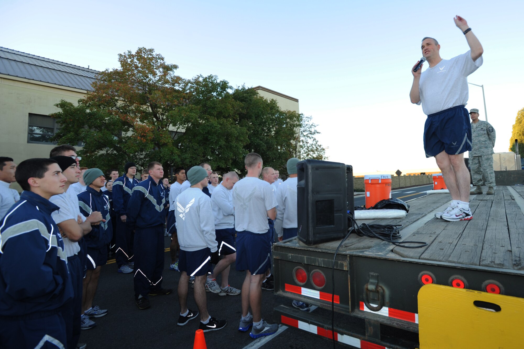 Col. Brian Newberry, 92nd Air Refueling Wing commander, speaks at the wing run at Fairchild Air Force Base, Wash., Sept. 20, 2013. Fairchild Airmen participate in the group run monthly to increase physical fitness and enhance unit morale. (U.S. Air Force photo by Staff Sgt. Veronica Montes/Released)