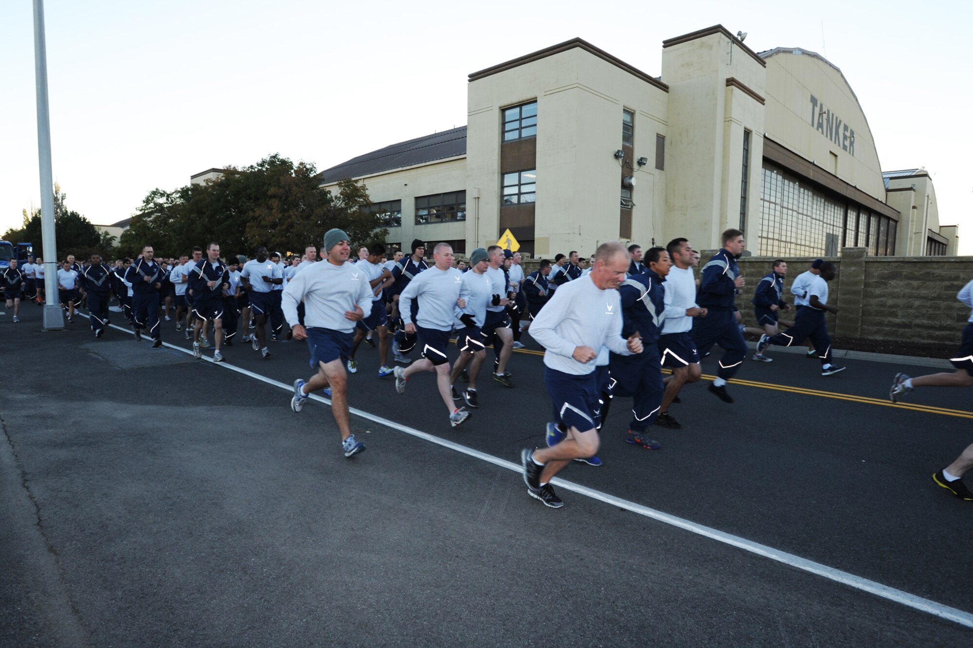 Members of Team Fairchild participate in the wing run at Fairchild Air Force Base, Wash., Sept 20, 2013. Fairchild Airmen participate in the group run monthly to increase physical fitness and enhance unit morale. (U.S. Air Force photo by Staff Sgt. Veronica Montes/Released)
