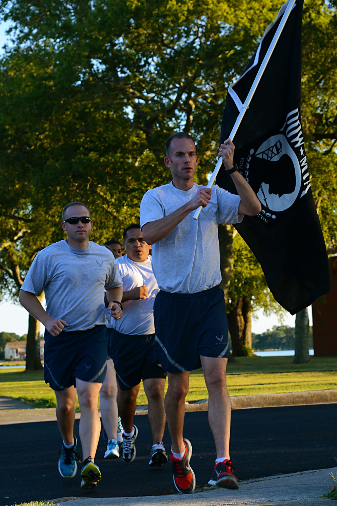 U.S. Air Force Service members run during the 24-hour POW/MIA event at Langley Air Force Base, Va., Sept. 19, 2013. More than 200 participants contributed to the event.  (U.S. Air Force photo by Airman 1st Class Victoria H. Taylor/Released)