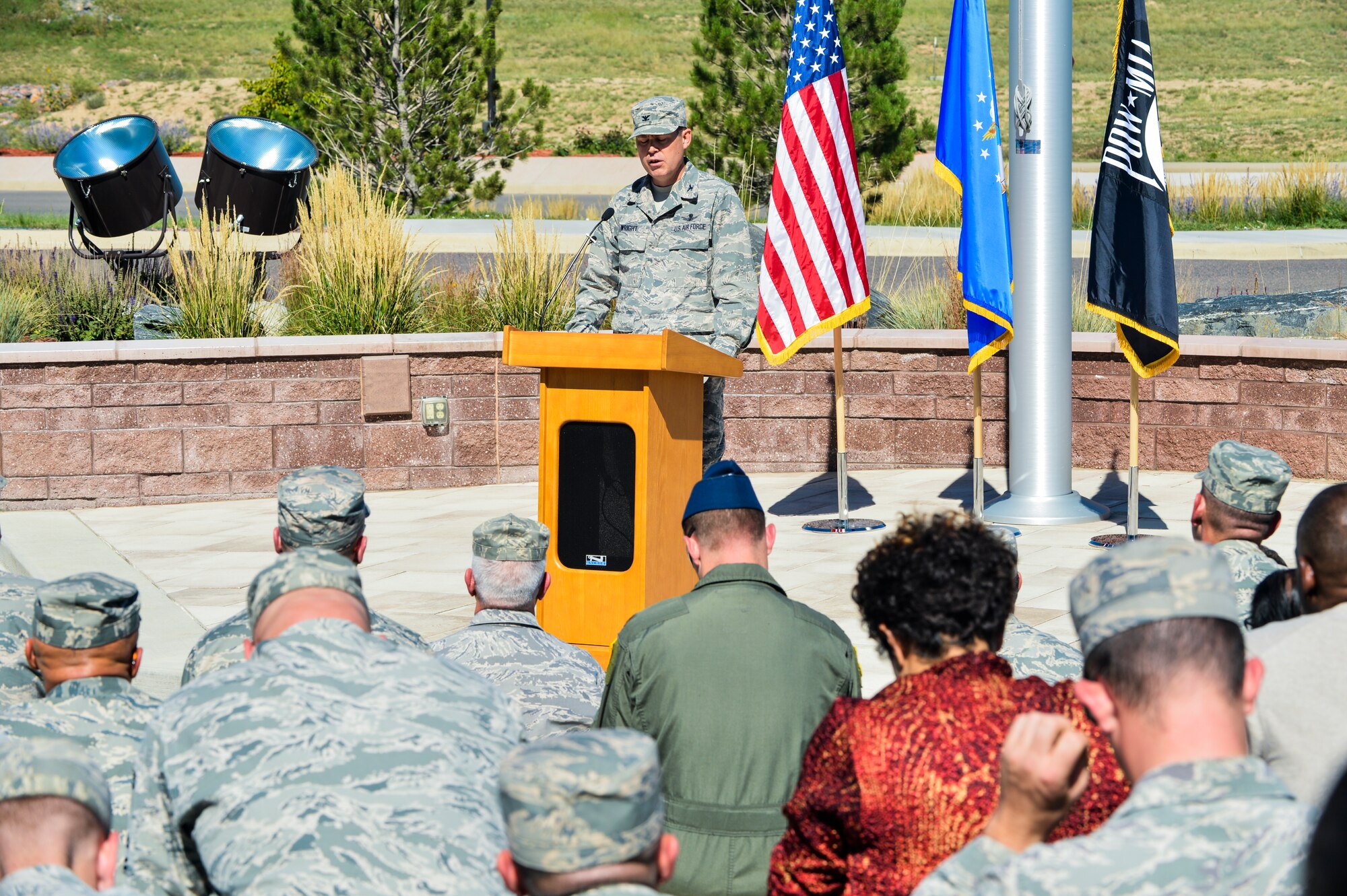 Col. Dan Wright, 460th Space Wing commander, gave closing remarks during the National POW/MIA Recognition Day ceremony Sept. 20, 2013, at the 460th Space Wing headquarters building on Buckley Air Force Base, Colo. National POW/MIA Recognition Day is acknowledged around the world on military installations and ships, and in state capitols, schools and veterans’ facilities. (U.S. Air Force photo by Staff Sgt. Paul Labbe/Released)