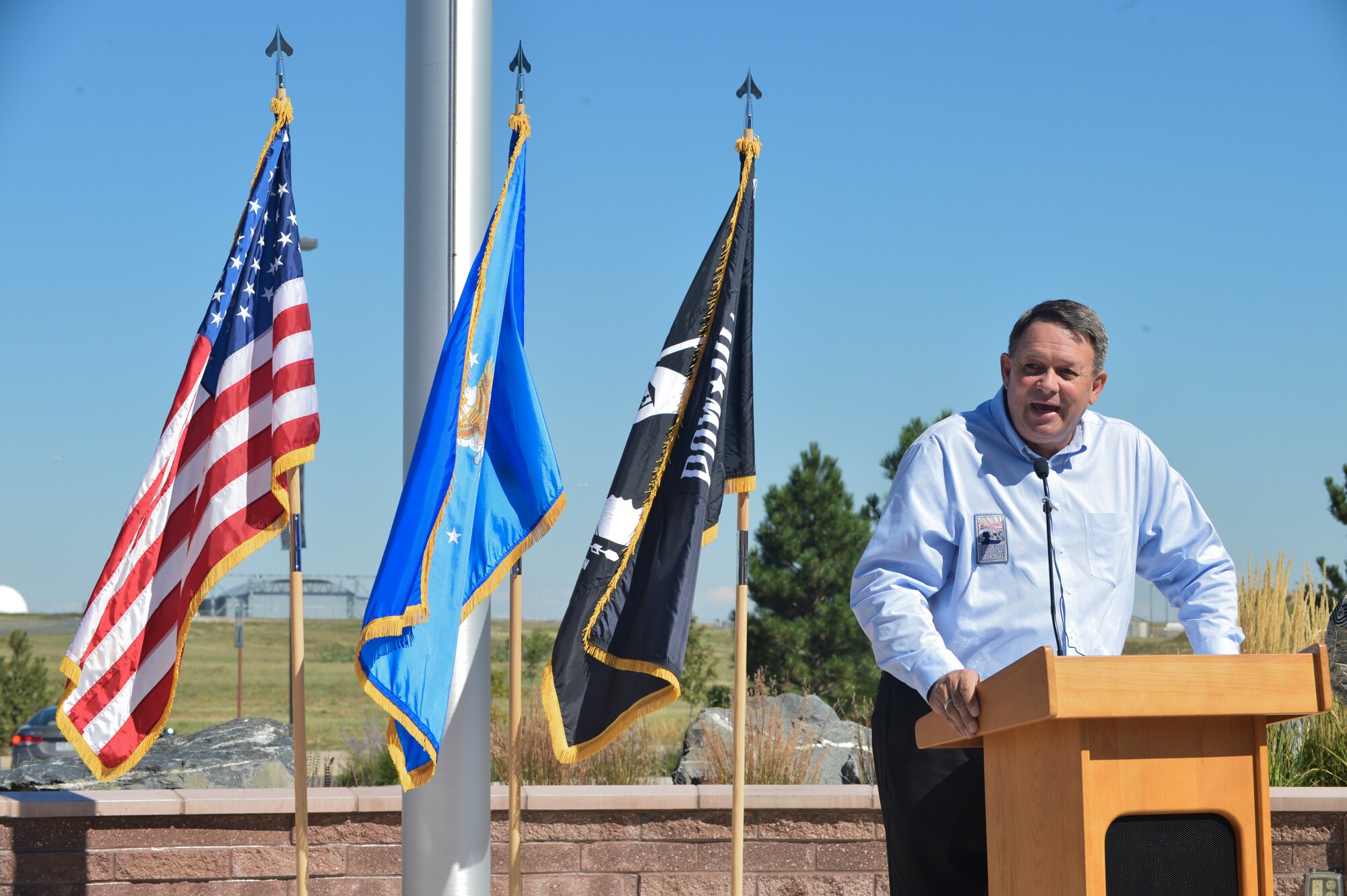 Rick Crandall, Colorado Freedom Memorial president, spoke during the National POW/MIA Recognition Day ceremony Sept. 20, 2013, at the 460th Space Wing headquarters building on Buckley Air Force Base, Colo. Crandall, an Air Force veteran, started the largest Veterans Day event in Denver known as the Veterans Salute.  (U.S. Air Force photo by Staff Sgt. Paul Labbe/Released)