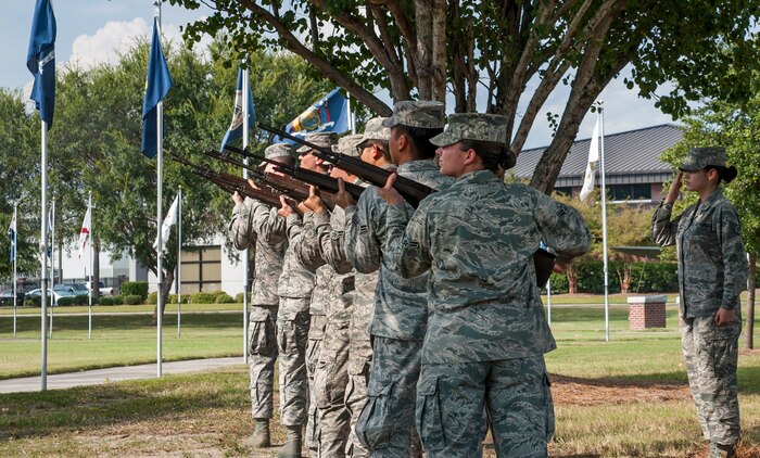 Airmen from the Joint Base Charleston Honor Guard render a 21-gun salute during the Prisoner of War/Missing in Action retreat ceremony Sept. 23, 2013, at JB Charleston – Air Base, S.C. (U.S. Air Force photo/Senior Airman Ashlee Galloway)