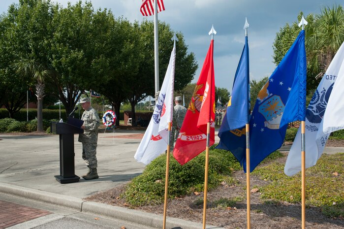 Col. Jeff DeVore, Joint Base Charleston commander, addresses the crowd during the Prisoner of War/Missing in Action retreat ceremony Sept. 23, 2013, at Joint Base Charleston – Air Base, S.C. (U.S. Air Force photo/Senior Airman Ashlee Galloway)