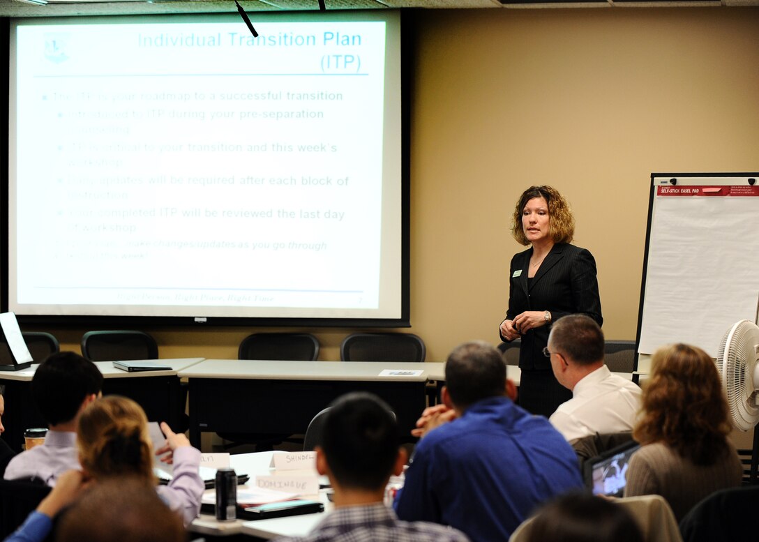 Julia Noe, a Transition Assistance Program Coordinator with the Airman and Family Readiness Center, gives opening remarks to dozens of students preparing to make the leap from active duty military service to civilian life during a past transition assistance class. The Readiness Center is hosting their annual Offutt Career Fair, scheduled for Oct. 3, 10 a.m. – 2:30 p.m. at the Bellevue Lied Center, and hopes the fair helps ease some of the anxiety accompanied with finding a job. (U.S. Air Force photo by Josh Plueger/Released)