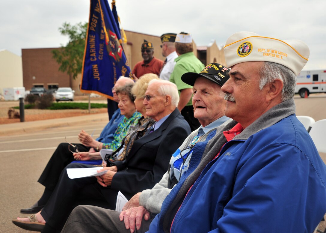 Local veterans listen attentively during a Prisoner of War/Missing in Action retreat ceremony Sept. 20, 2013 at Cannon Air Force Base, N.M. Since 1979, POW/MIA Day has been observed across the nation on the third Friday of September each year, allowing Americans to remember those service members who made selfless sacrifices for their nation and those who never came home. (U.S. Air Force photo/Senior Airman Whitney Tucker)