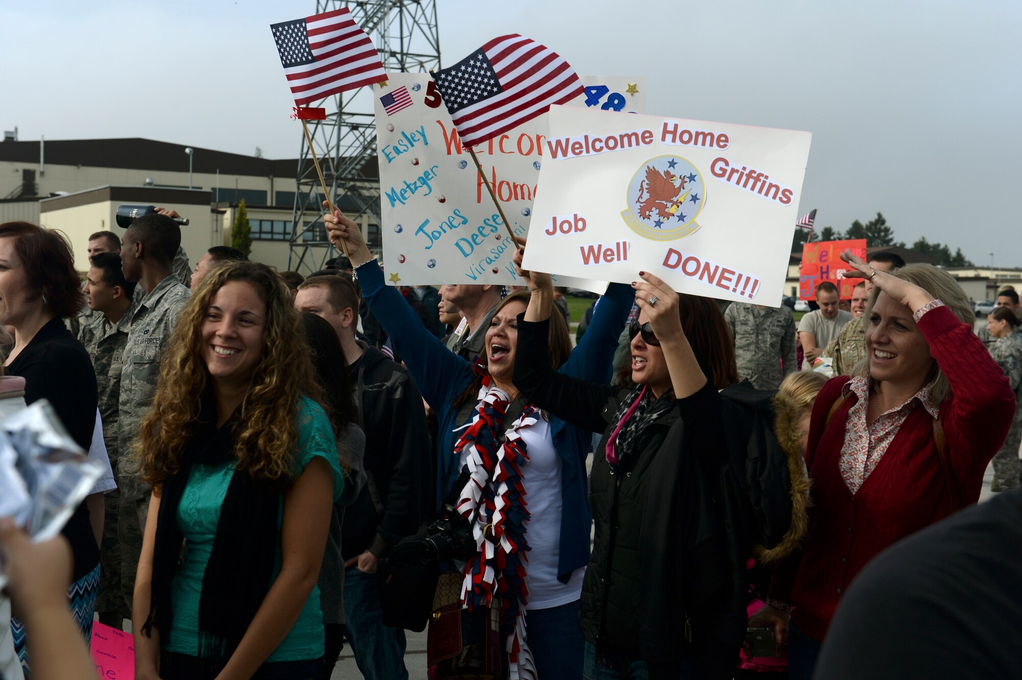 SPANGDAHLEM AIR BASE, Germany—Members of Saber Nation welcome home Airmen returning form deployment during the 480th Fighter Squadron and supporting squadron’s homecoming Sept. 23, 2013. The 480th FS is home to United States Air Forces in Europe's only Viper also known as the F-16 Block 50 squadron. (U.S. Air Force photo by Senior Airman Rusty Frank/Released)