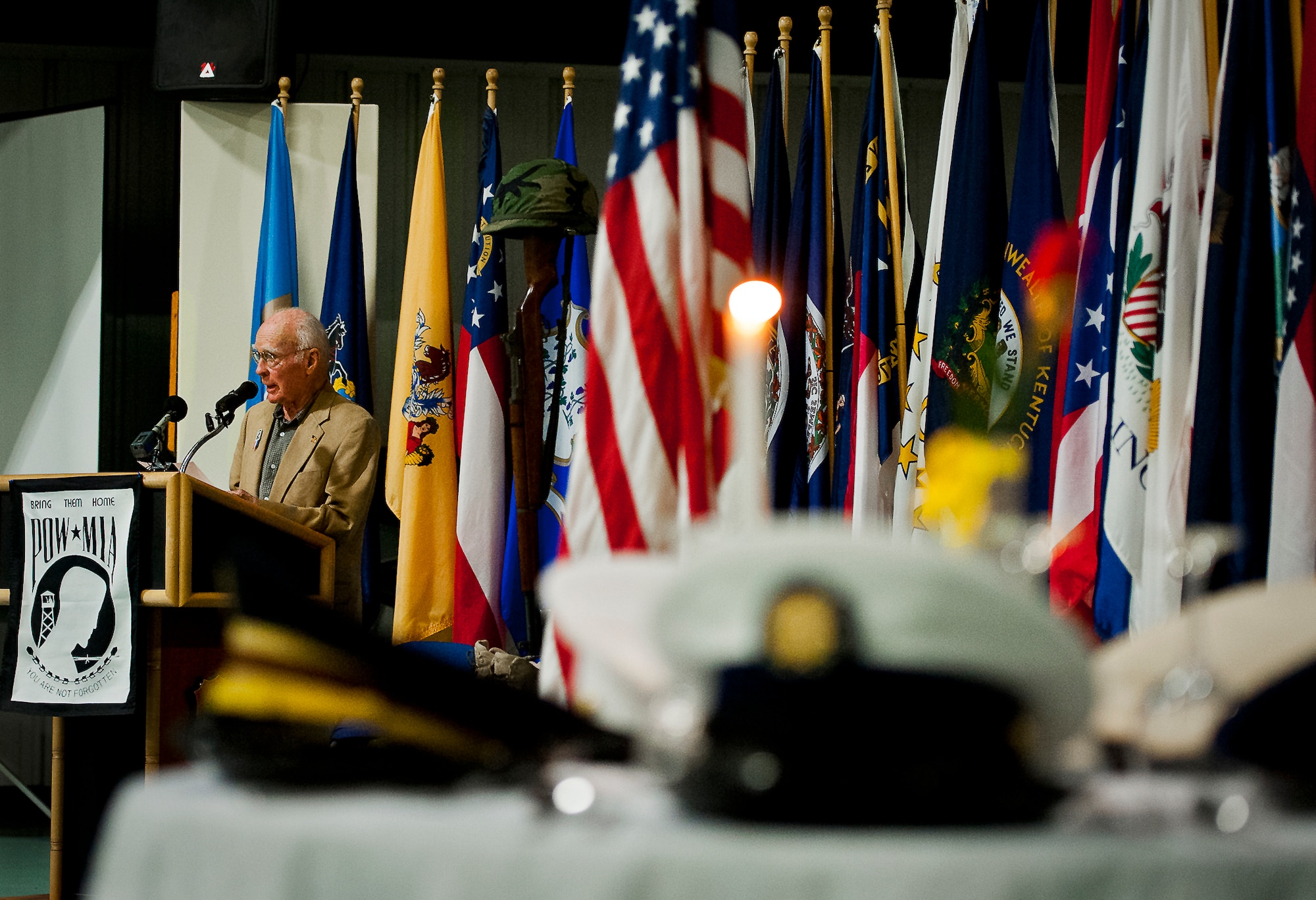 Guest speaker, retired Col. John Streit, spoke about his imprisonment during the Korean War at the POW/MIA ceremony Sept. 20 at the Air Force Armament Museum. The ceremony paid tribute to those military members who have yet to return home from defending America. The event featured tributes, guest speakers and honor guard procedures. (U.S. Air Force photo/Samuel King Jr.)