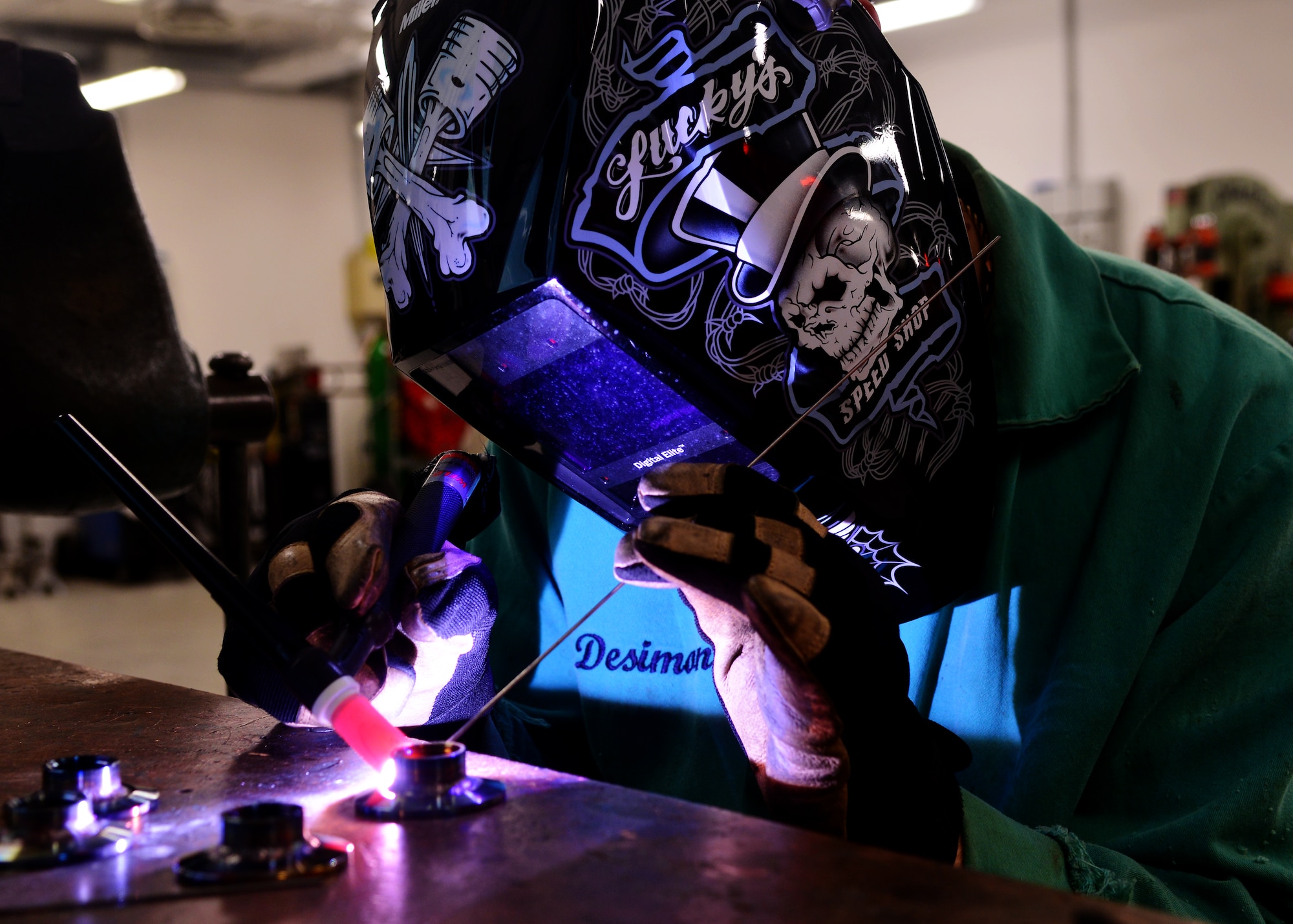 Staff Sgt. Michael Desimone, 31st Maintenance Squadron aircraft metals technology craftsman, welds a fitting for a coolant machine, Sept. 16, 2013, at Aviano Air Base, Italy. Metals technology Airmen design, weld and fabricate machine precision tools, components and assemblies for aerospace weapon systems and other support equipment. (U.S. Air Force photo/Senior Airman Briana Jones)