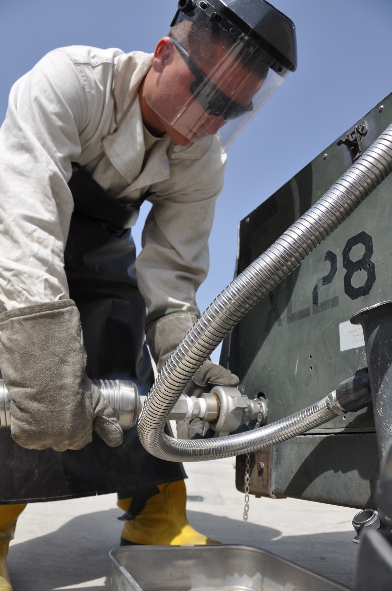 Staff Sgt. Andrew Mitalski, 455th Expeditionary Logistics Readiness Squadron distribution supervisor, deployed from Shaw Air Force Base, S.C., and a native of Hudson, Ohio, prepares to fill a liquid oxygen cart at Bagram Airfield, Afghanistan, Sept. 18, 2013. The 455th ELRS fuels management flight here receives, stores and issues cryogenic products, or liquid oxygen. (U.S. Air Force photo/Tech. Sgt. Rob Hazelett)