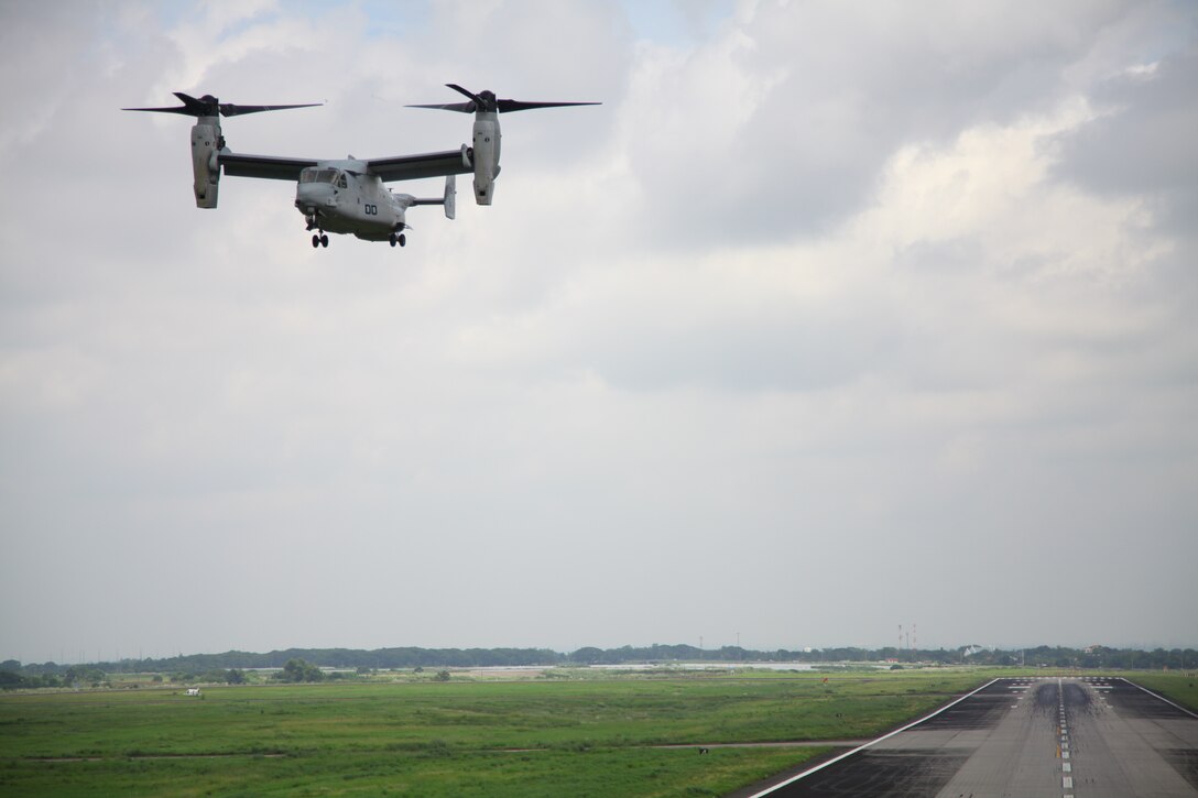 An MV-22B Osprey prepares to land after conducting a site-survey mission over Pampanga, Republic of the Philippines, Sept. 17 as part of Amphibious Landing Exercise 2014. The mission provided the Marines with training opportunities not available in some parts of the Asia-Pacific region. The Osprey is with Marine Medium Tiltrotor Squadron 166, part of the 13th Marine Expeditionary Unit's aviation combat element.