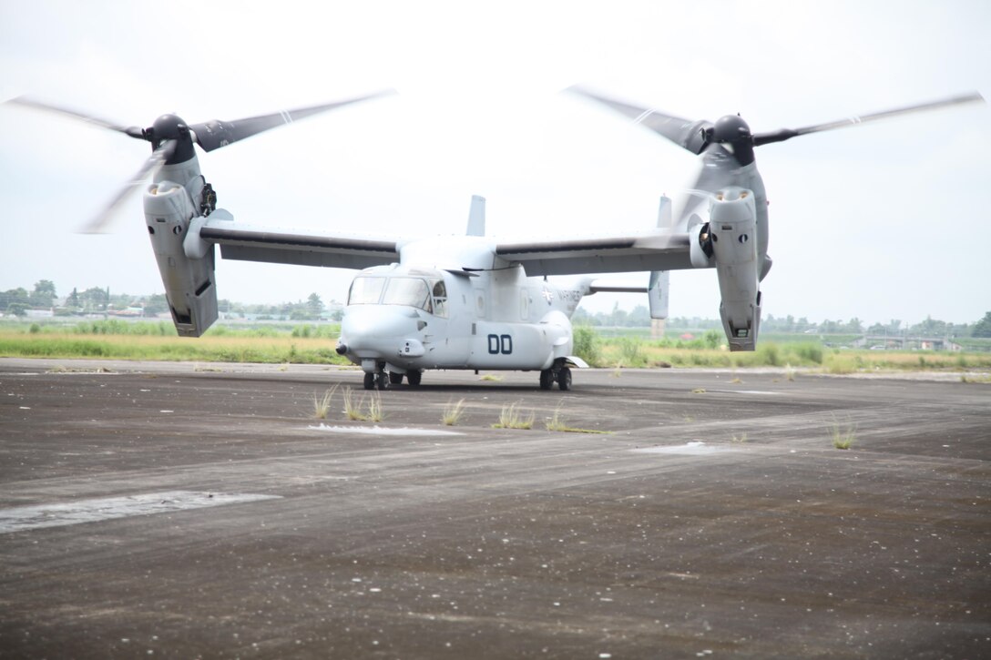 An MV-22B Osprey prepares to take off for a site-survey mission over Pampanga, Republic of the Philippines, Sept. 17 as part of Amphibious Landing Exercise 2014. The mission helped the Marines develop a more thorough understanding of the training areas. The Osprey is with Marine Medium Tiltrotor Squadron 166, part of the 13th Marine Expeditionary Unit's aviation combat element