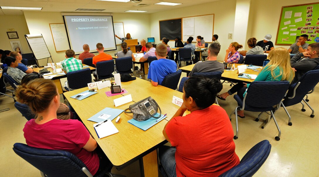 Airmen and Sailors from Joint Base Pearl Harbor-Hickam, Hawaii, listen attentively during the Million Dollar Sailor/Airman program at the Military and Family Support Center at JBPHH, Hawaii, Sept. 18, 2013. Attendees receive training on proper budgeting techniques, credit management, savings and investment options, insurance, military pay and allowances, consumer rip-offs , how to obtain a loan, credit score, reports, and new and used car purchasing tips. (U.S. Air Force photo/Tech. Sgt. Jerome S. Tayborn)