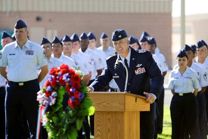 Col. Pete Ford, 57th Adversary Tactics Group commander and guest speaker, addresses the crowd at the National Prisoner of War/Missing in Action Recognition Day ceremony Sept. 20, 2013, at Nellis Air Force Base, Nev. The ceremony included the laying of a POW/MIA ceremonial wreath and the reciting of names of Nevadans who are war prisoners and those who are still missing.  (U.S. Air Force photo by Lorenz Crespo)