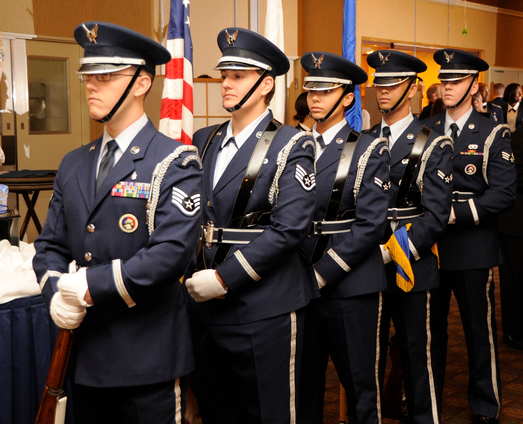 Members from the Misawa Honor Guard stand in formation during the 66th Annual U.S. Air Force Ball at Misawa Air Base, Japan, Sept. 21, 2013. This year's theme focused on “Airmen Powered by Innovation” and highlights a critical priority for the U.S. Air Force. (U.S. Air Force photo by Airman 1st Class Kaleb Snay)
