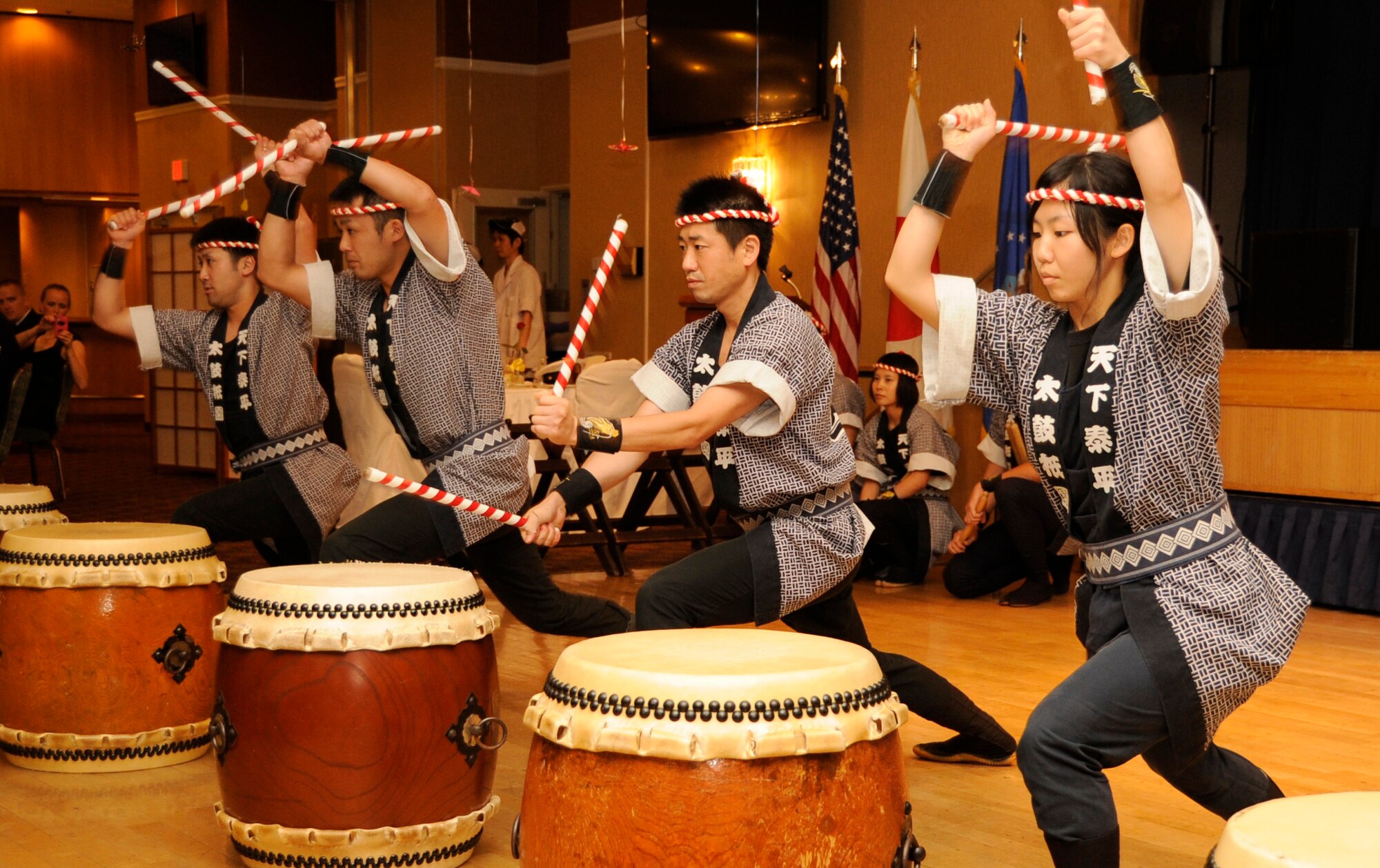 The Japanese Air Self-Defense Force Taiko Drum Band performs during the 66th Annual U.S. Air Force Ball at Misawa Air Base, Japan, Sept. 21, 2013. They held an official celebration at the collocated club to commemorate the Air Force's 66th birthday and 66 years of “Airman Powered by Innovation.” (U.S. Air Force photo by Airman 1st Class Kaleb Snay)