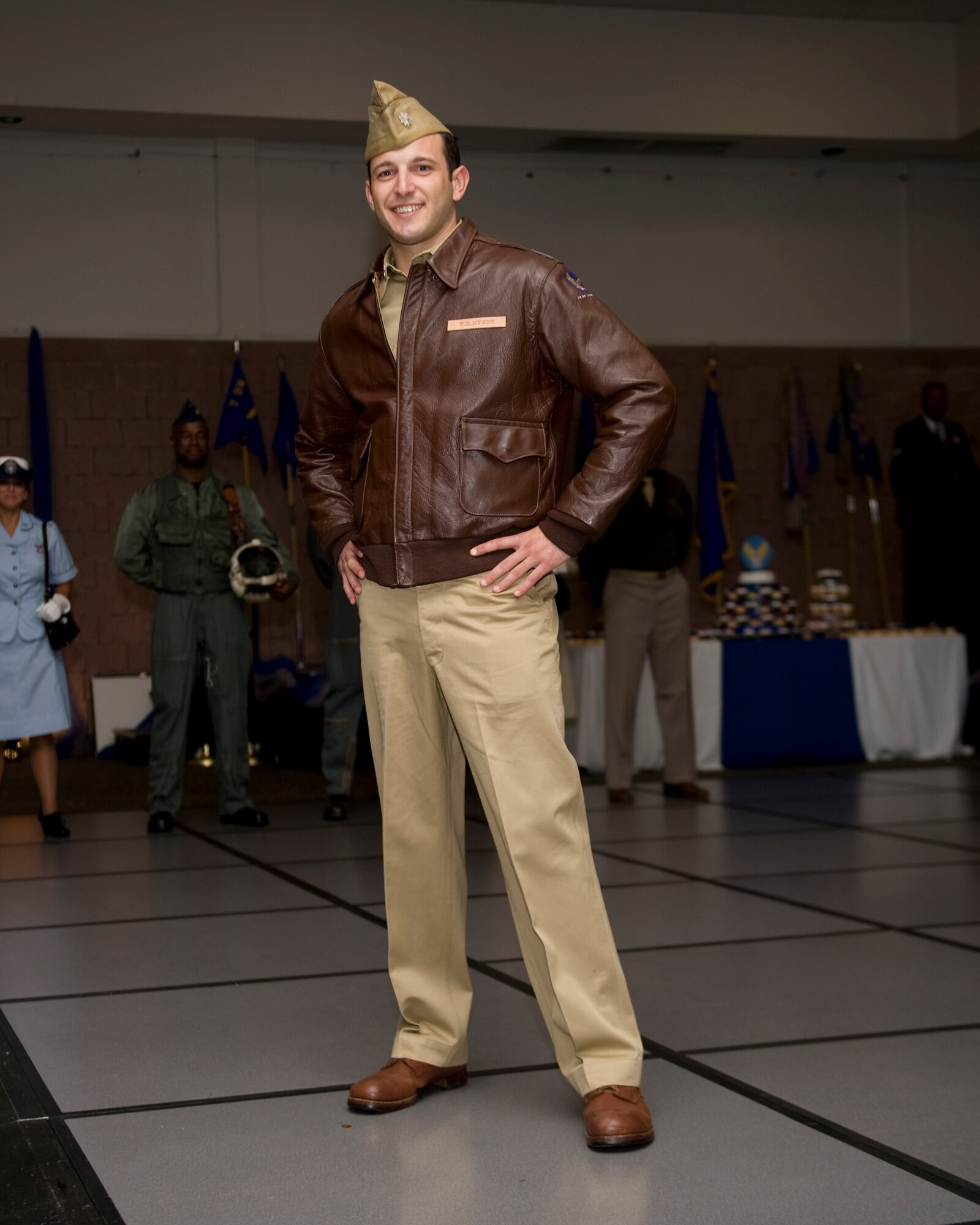 U.S. Air Force Staff Sgt. Jonathan Rodgers, 7th Comptroller Squadron, wears a uniform representing Lt. Col.  William Edwin Dyess, during the ball at the Civic Center, in Abilene, Texas, Airmen displayed Air Force uniforms from different time periods throughout Air Force history as part of small skit in commemoration of the Air Force’s 66th birthday. (U.S. Air Force photo by Airman 1st Class Alexander Guerrero/Released)