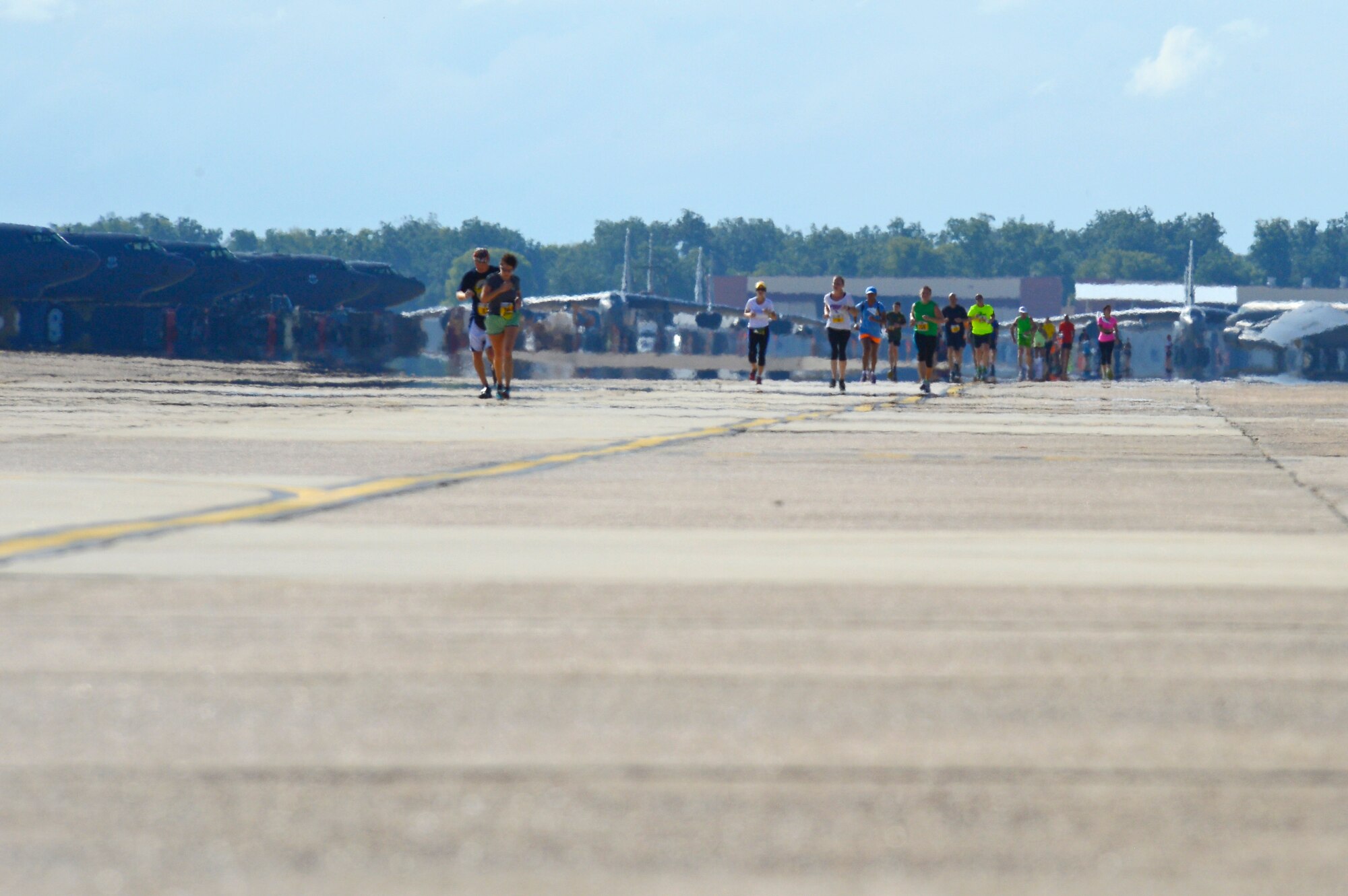 Participants of the Barksdale Half Marathon run on Barksdale Air Force Base, La., Sept. 21, 2013. The last mile of the 13.1 mile half marathon was ran on the flightline. More than 600 people participated in the event. (U.S. Air Force photo/Senior Airman Micaiah Anthony)