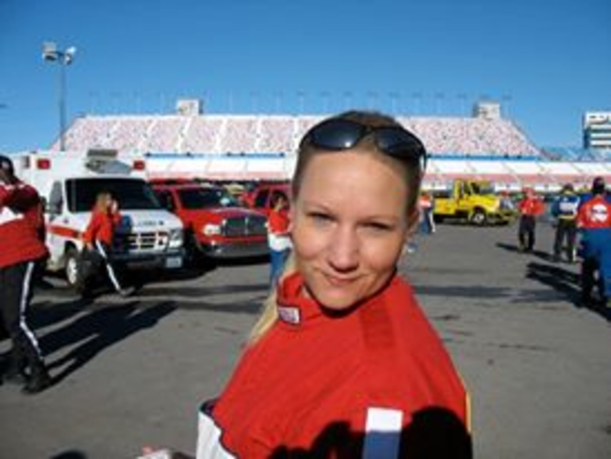 VANDENBERG AIR FORCE BASE, Calif. -- Tech. Sgt. Erin L. Tallman, non commissioned officer in charge of knowledge operations in the 14th Air Force Knowledge Management office, Vandenberg Air Force Base, Calif., is a proud member of the Las Vegas Motor Speedway Pit Fire Crew. With 16 races under her belt, Tallman is preparing to work number 17 during the NASCAR Camping World Truck Series Race set for Sept. 28, 2013 in Las Vegas, Nev.
 (Courtesy Photo) 
