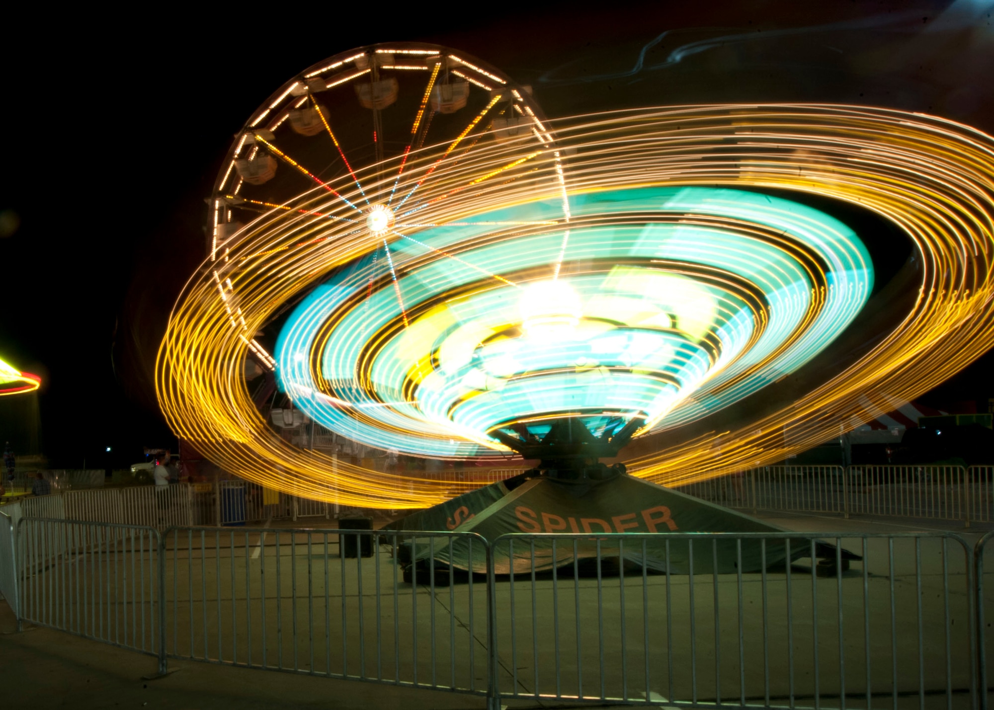 The Texas Oklahoma fair celebrated a military appreciation night for all the community work Airmen do in Wichita Falls, Texas Sept. 17. Each ride and attraction was open to the public while Airmen from the 366th Training Squadron provided volunteers for the event. (U.S. Air Force photo by Airman 1st Class Jelani Gibson)