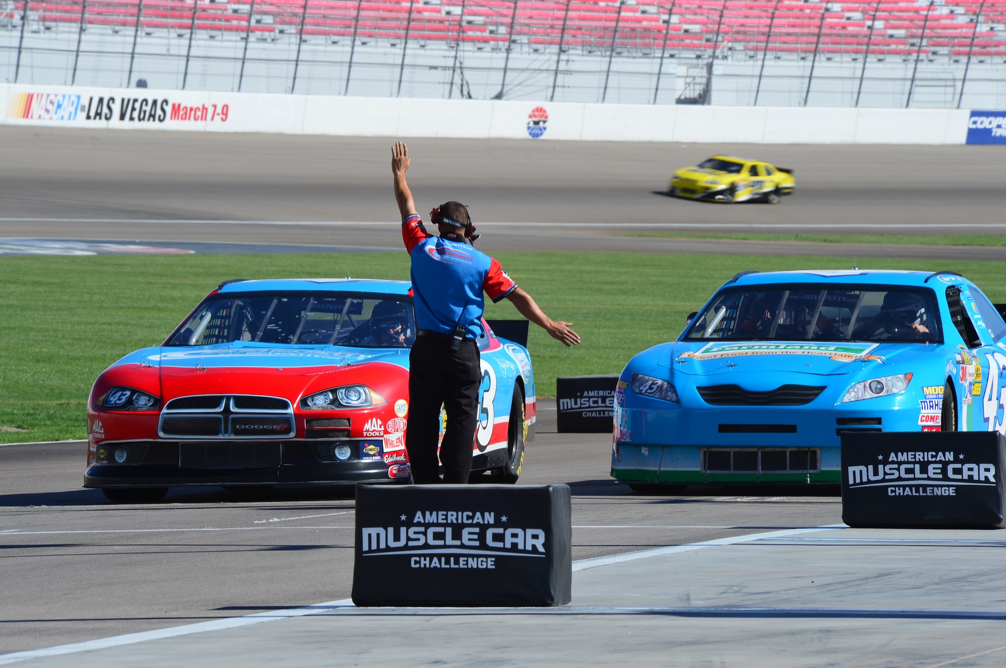 Airmen from Creech and Nellis Air Force Bases prepare to race during the Richard Petty Diving Experience at the Las Vegas Motor Speedway in Las Vegas, Nev., Sept. 22, 2013. The event was sponsored by Nellis Outdoor Recreation Single Airmen Incentive Program and like other events it was provided at little or no cost to the participants. (U.S. Air Force photo by Staff Sgt. N.B.)